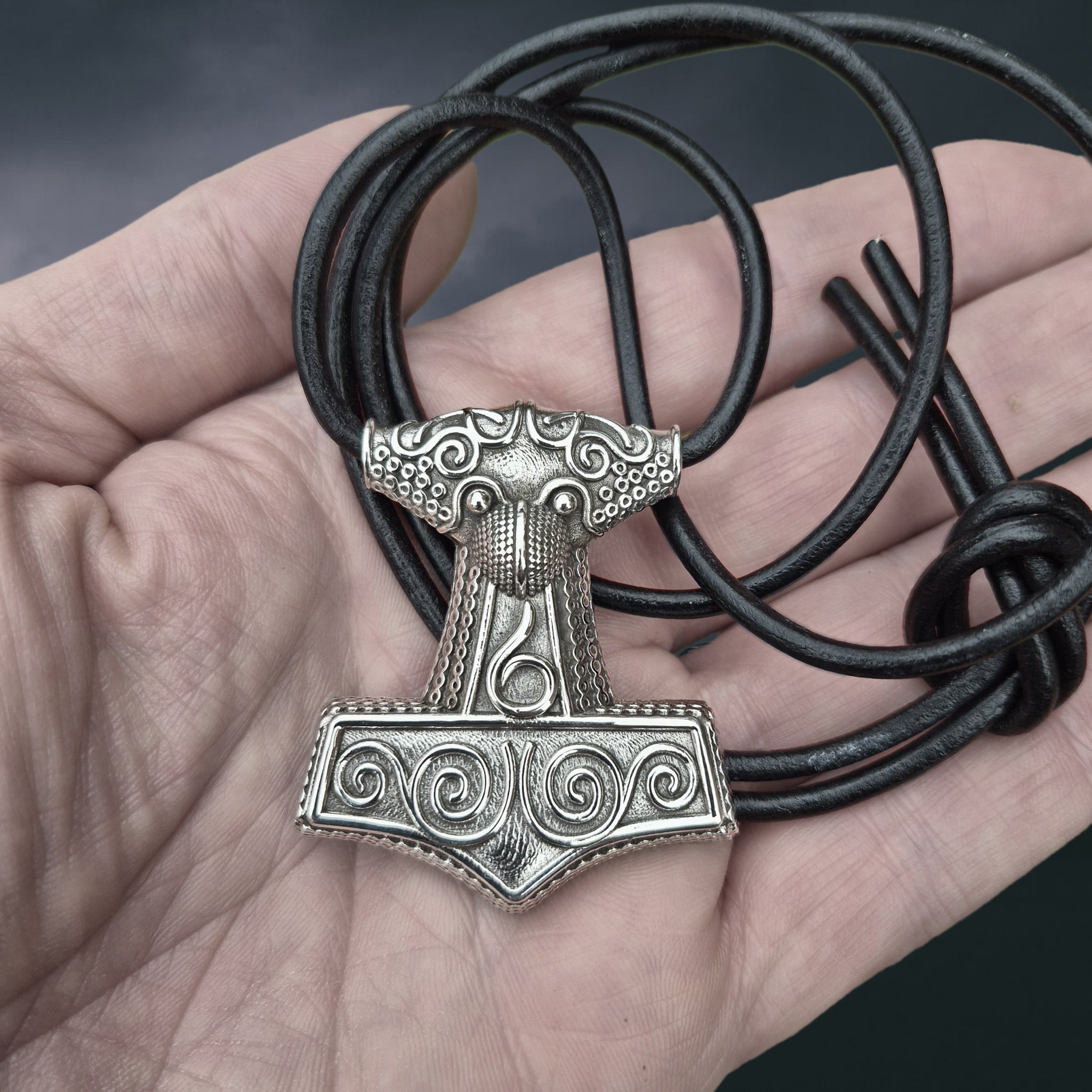 Large Silver Skåne Thor's Hammer Pendant Replica on 3mm Black Leather Cord, on Hand