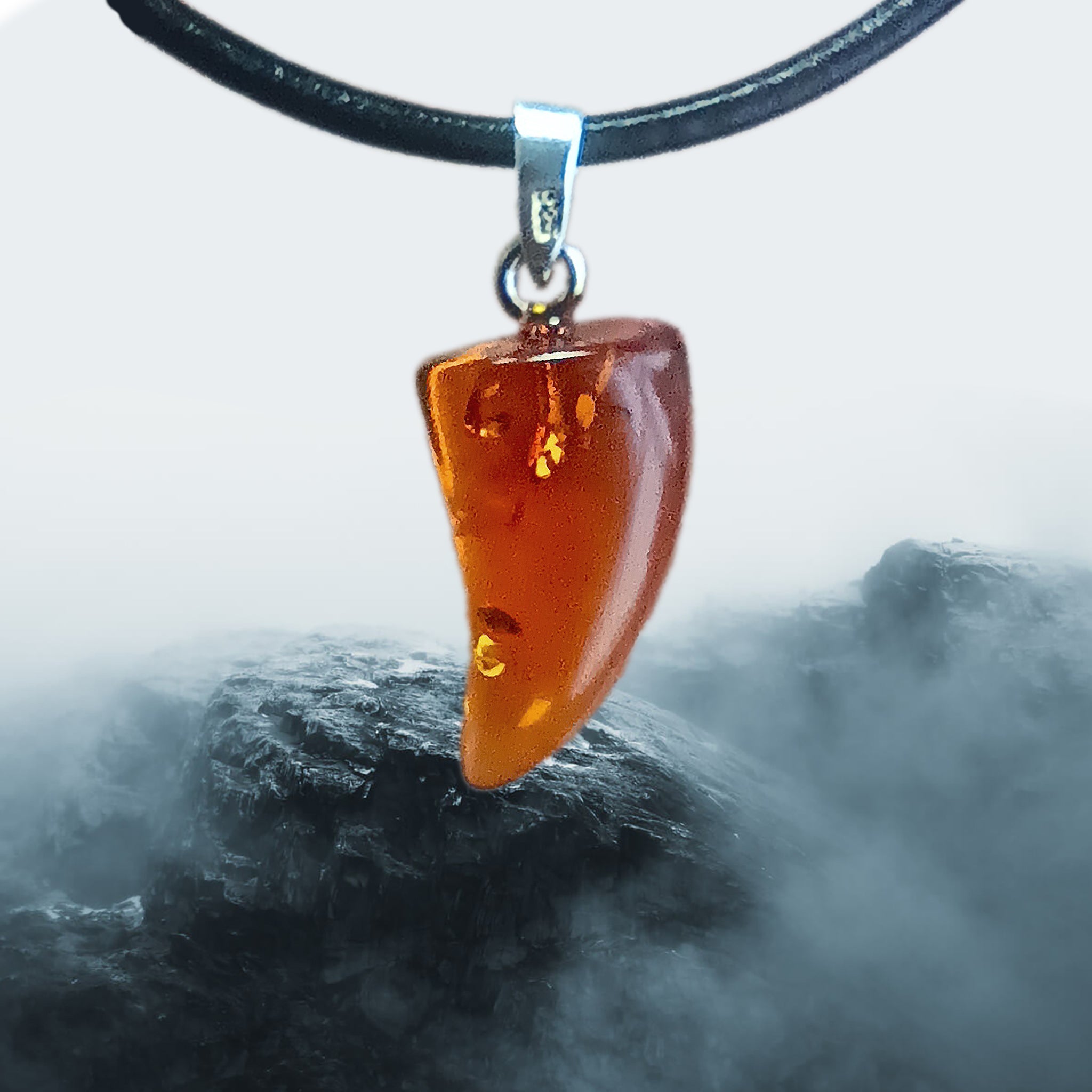 Hand-Cut &amp; Polished Amber Pendant, Shaped into a Wolf's / Dragon's Tooth with Sterling Silver Hanger on Lather Cord