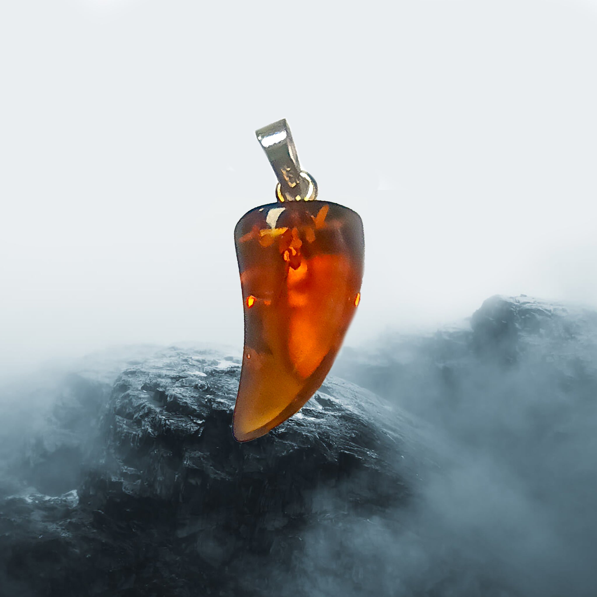 Hand-Cut &amp; Polished Amber Pendant, Shaped into a Wolf's / Dragon's Tooth with Sterling Silver Hanger