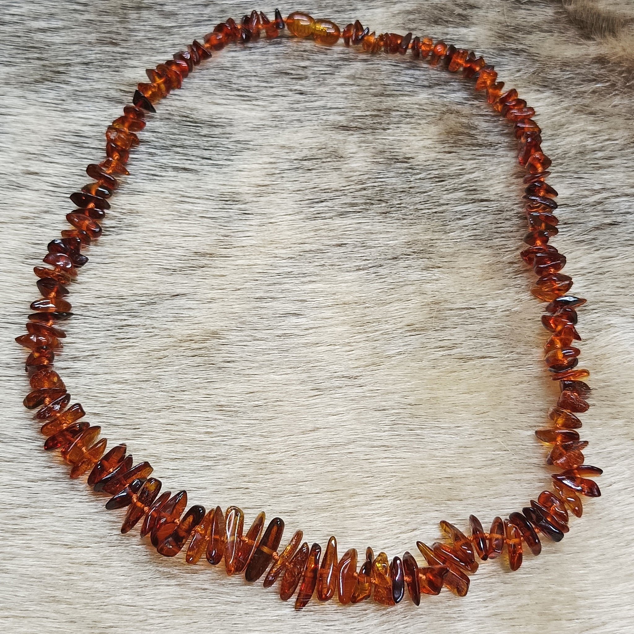 Amber Viking Necklace, Made From Cut and Polished Dark Amber Chips - on Fur