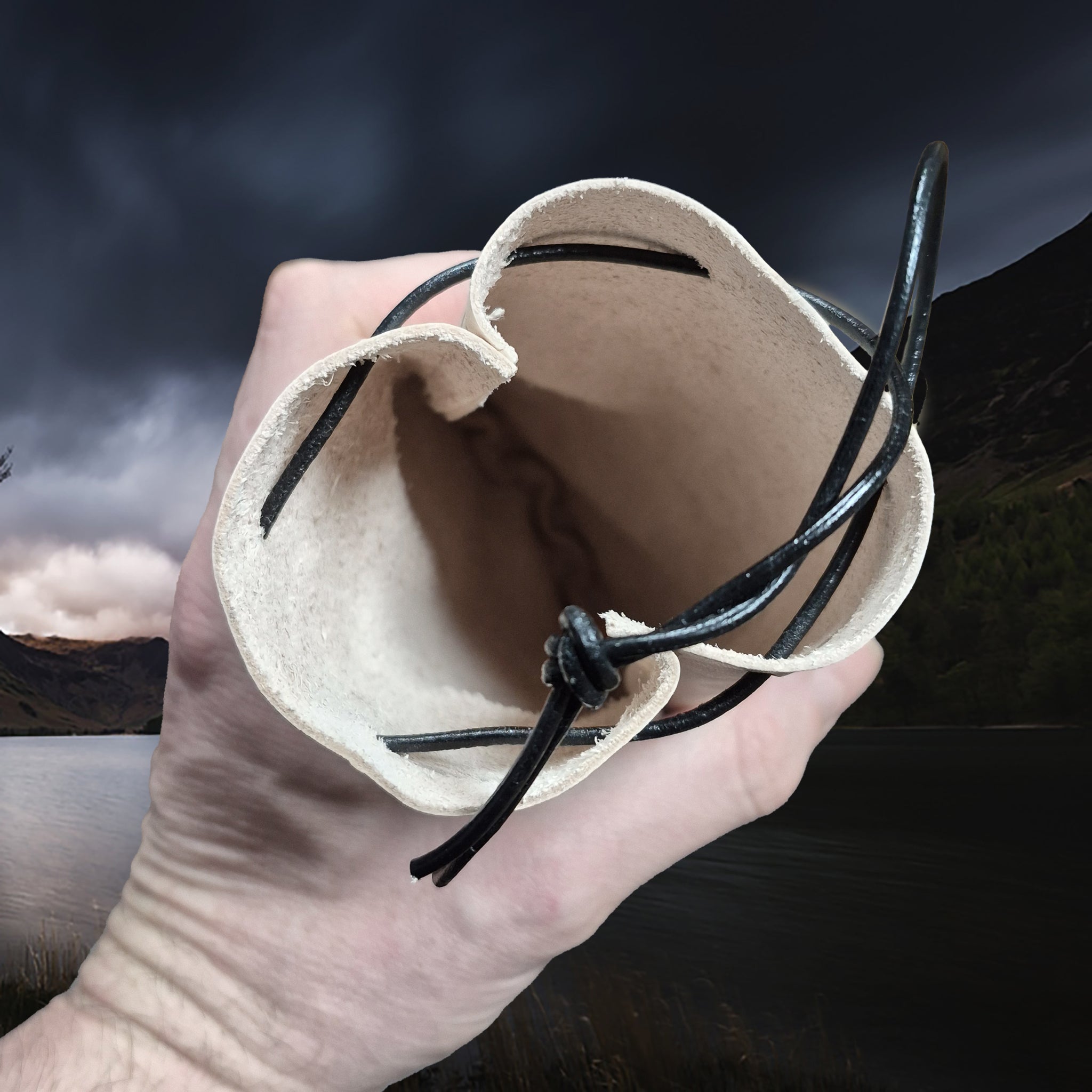Medium Sized Natural Veg-Tan Leather Viking Pouch with Leather Drawstring in Hand - Inside View