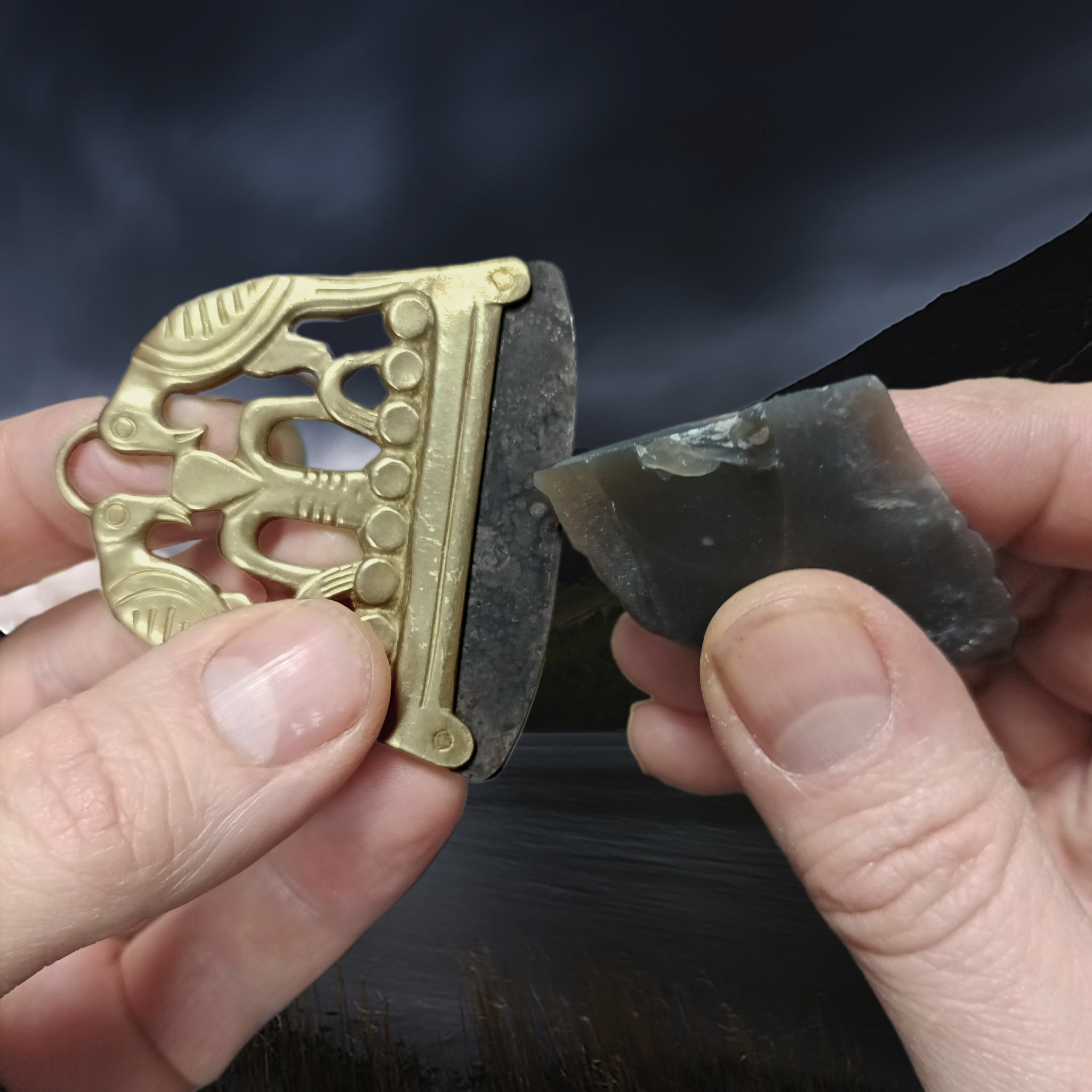 Bronze Viking Fire Steel Replica with Odin & Ravens Design in Fingers with Flint