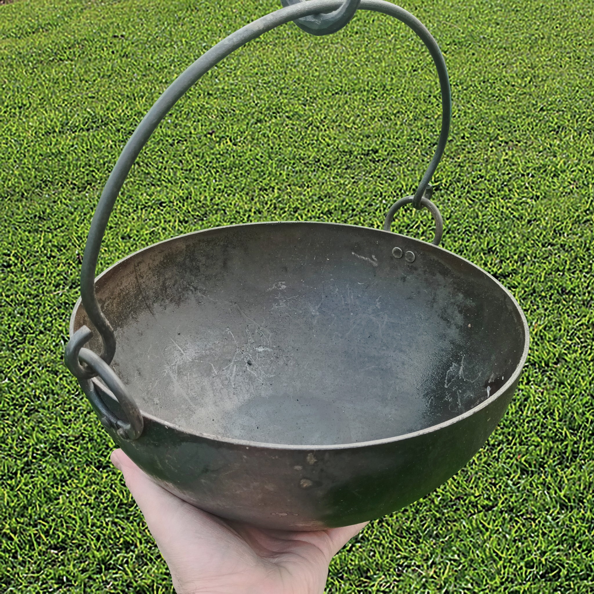 Handmade Steel Cauldron / Cooking Pot with Hand-Forged Iron Handle with Hand Underneath for Scale