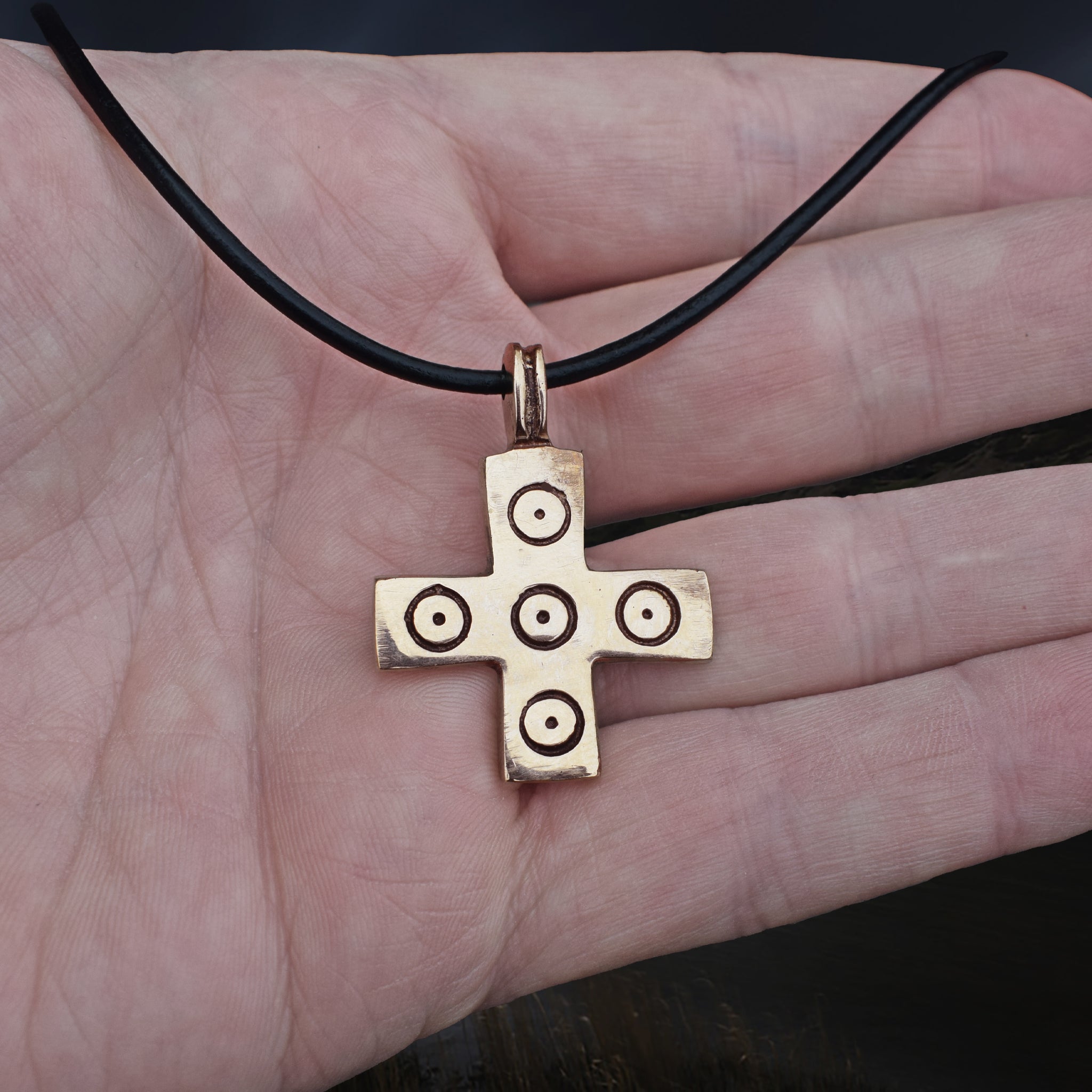 Bronze Replica Viking / Saxon Cross / Crucifix Pendant with 5 Dot Pattern on Leather Cord, on Hand