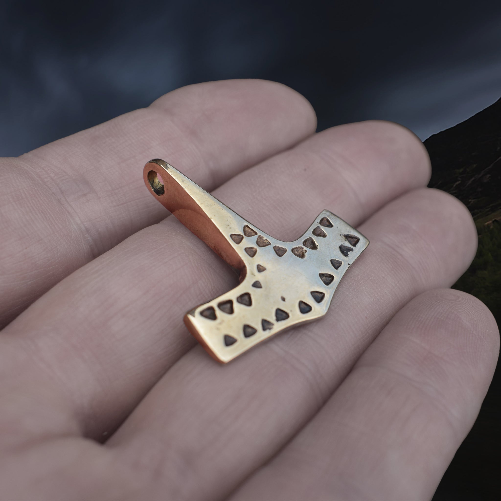 Bronze Viking Thor's Hammer Pendant Replica from 10th Century Denmark with Triangle Patterns on Hand - Side Angle View