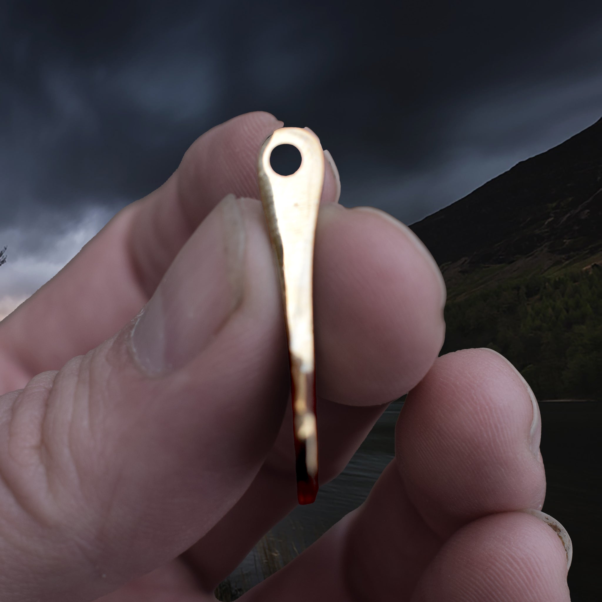 Bronze Replica Thors Hammer Pendant from 10th Century Denmark with Dot & Ring Design in Fingers - Side View