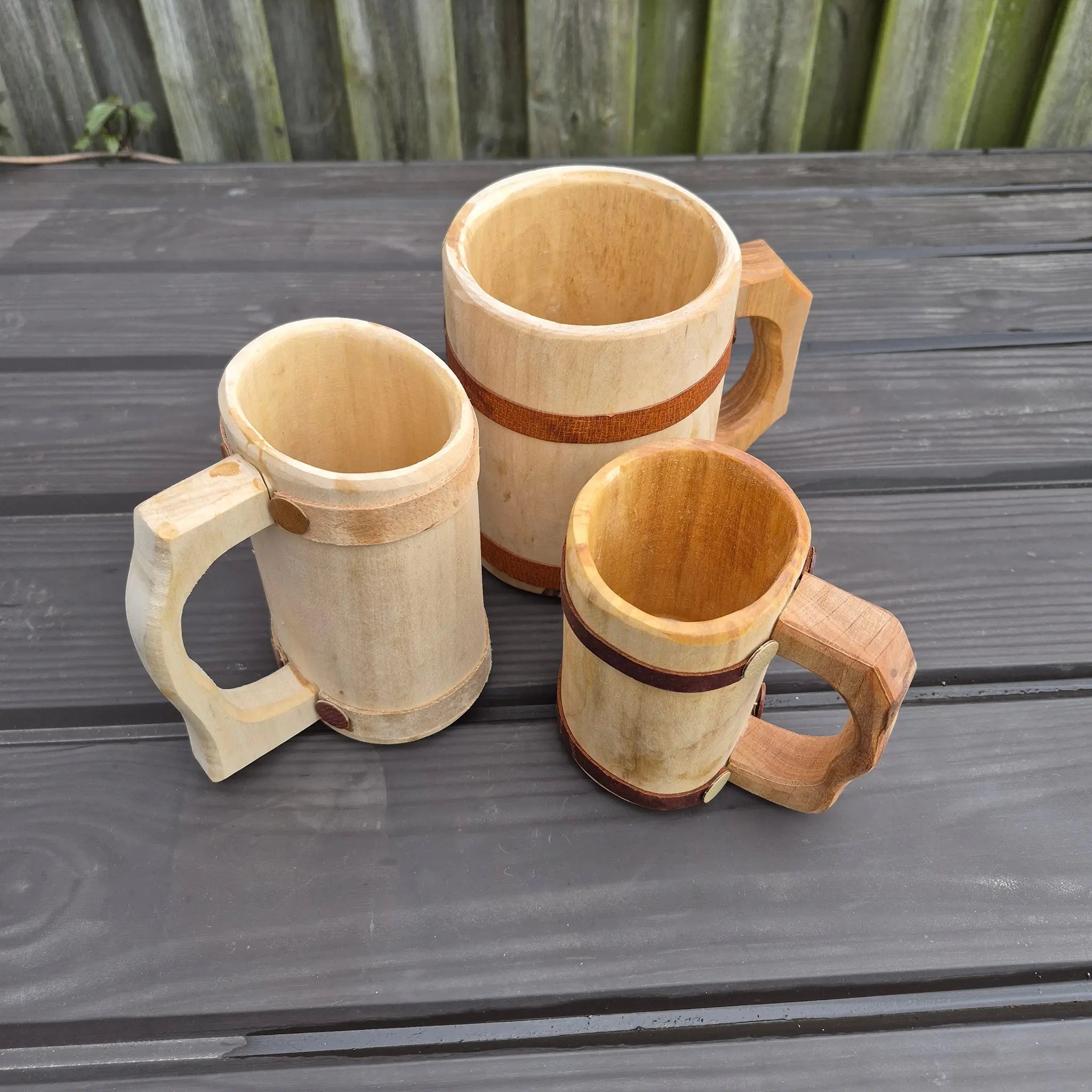 Hand-Carved Medieval Style Alder Wood Beer Tankards Together - Above Angle View