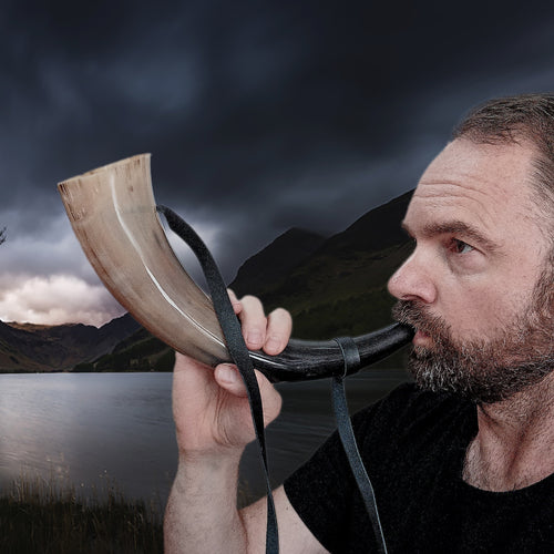 Blowing a Small Polished Viking Blowing Horn / Bugle