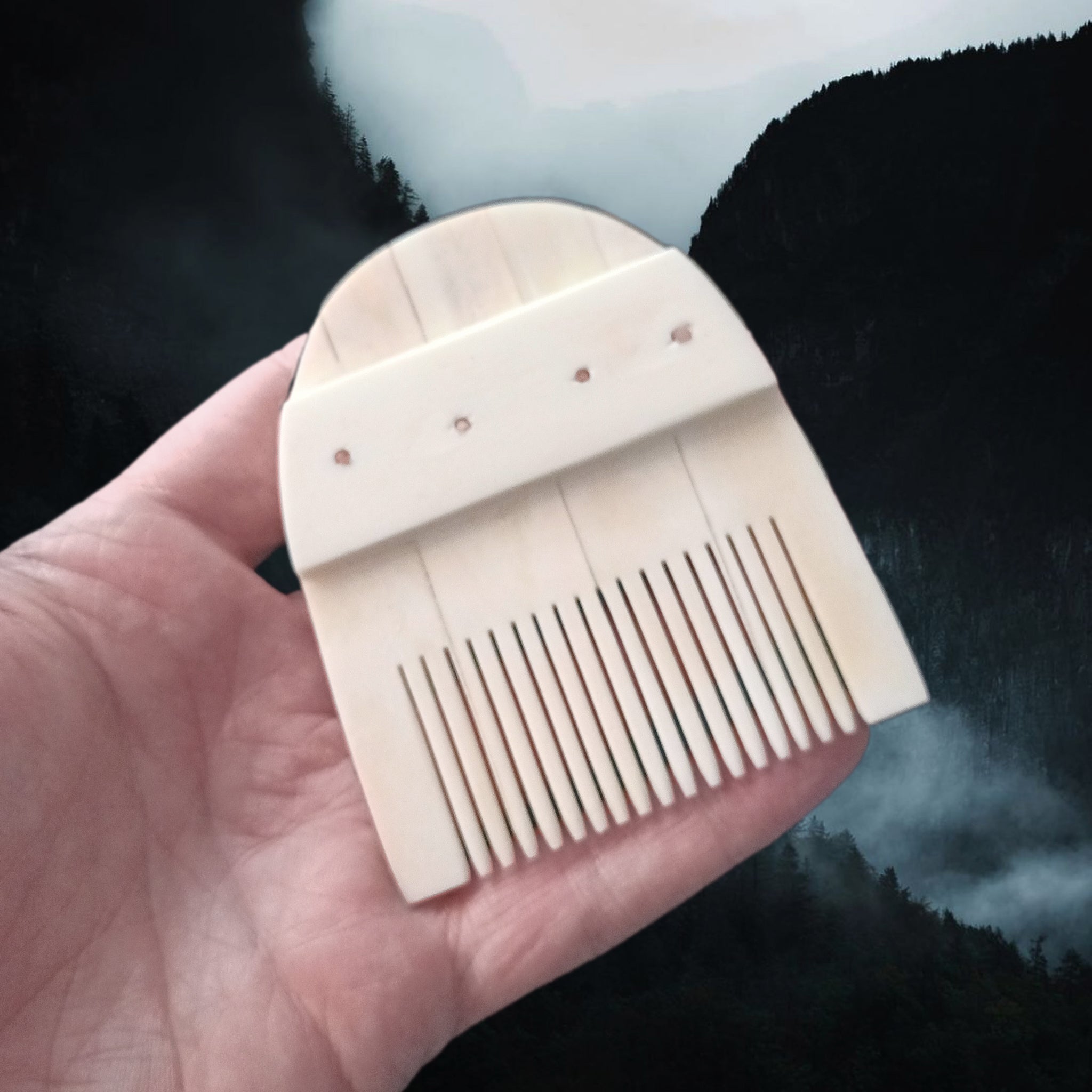 Authentic Handmade Replica Viking Bone Comb in a Rounded Shape in Hand