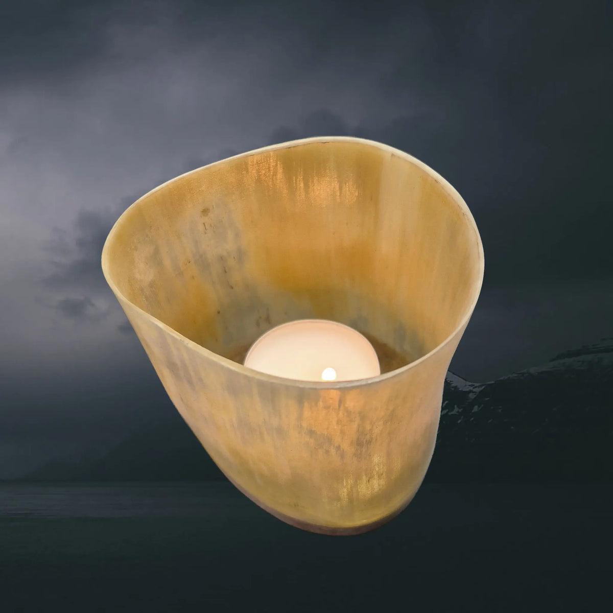 Handmade Cow Horn Viking Style Tealight Holder with Wood Base with Tealight Inside - Above Angle View