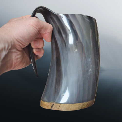Large Polished Ox Horn Beer Mug in Hand - Side View