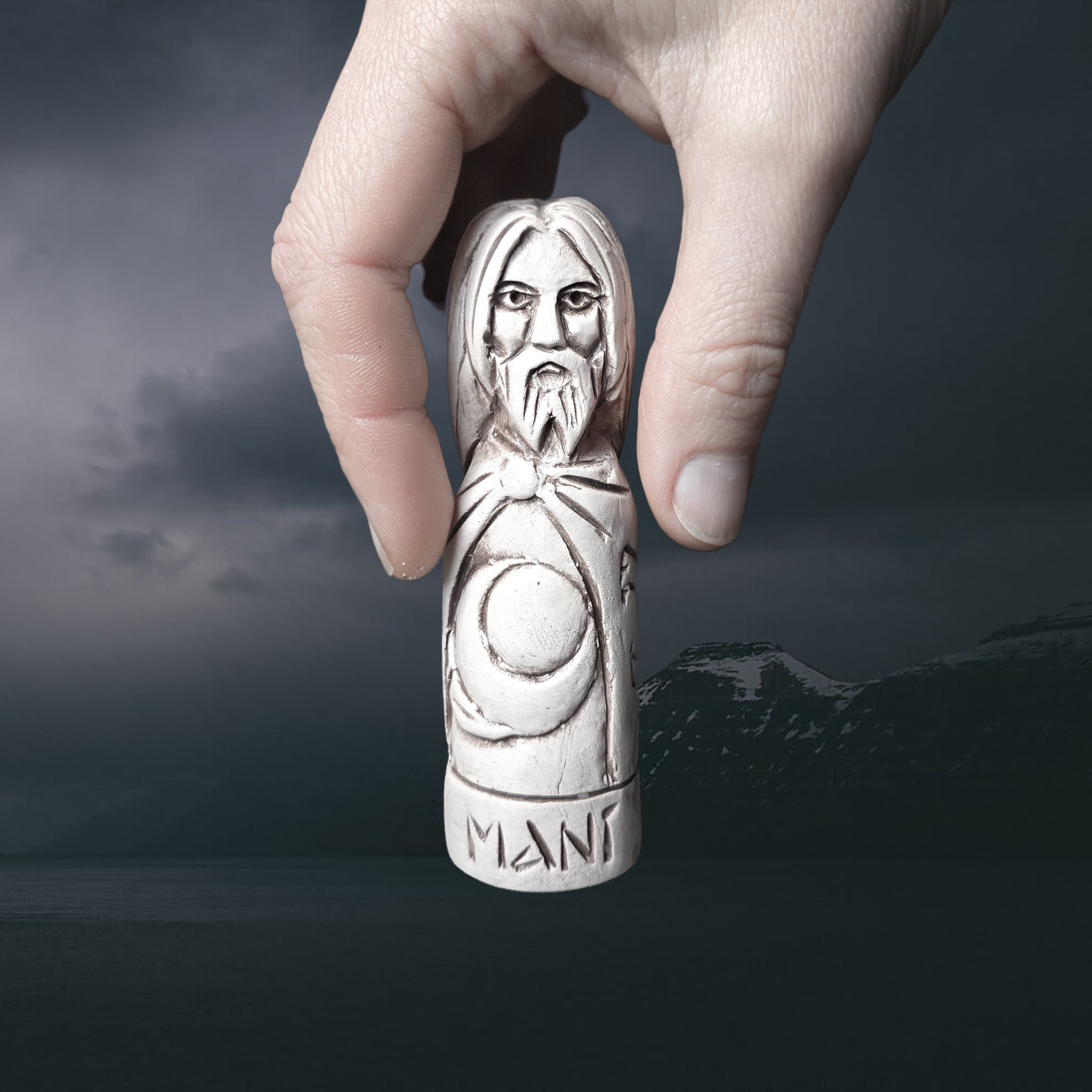Statuette of the Norse God Mani in Hand-Crafted Clay in Hand for Scale