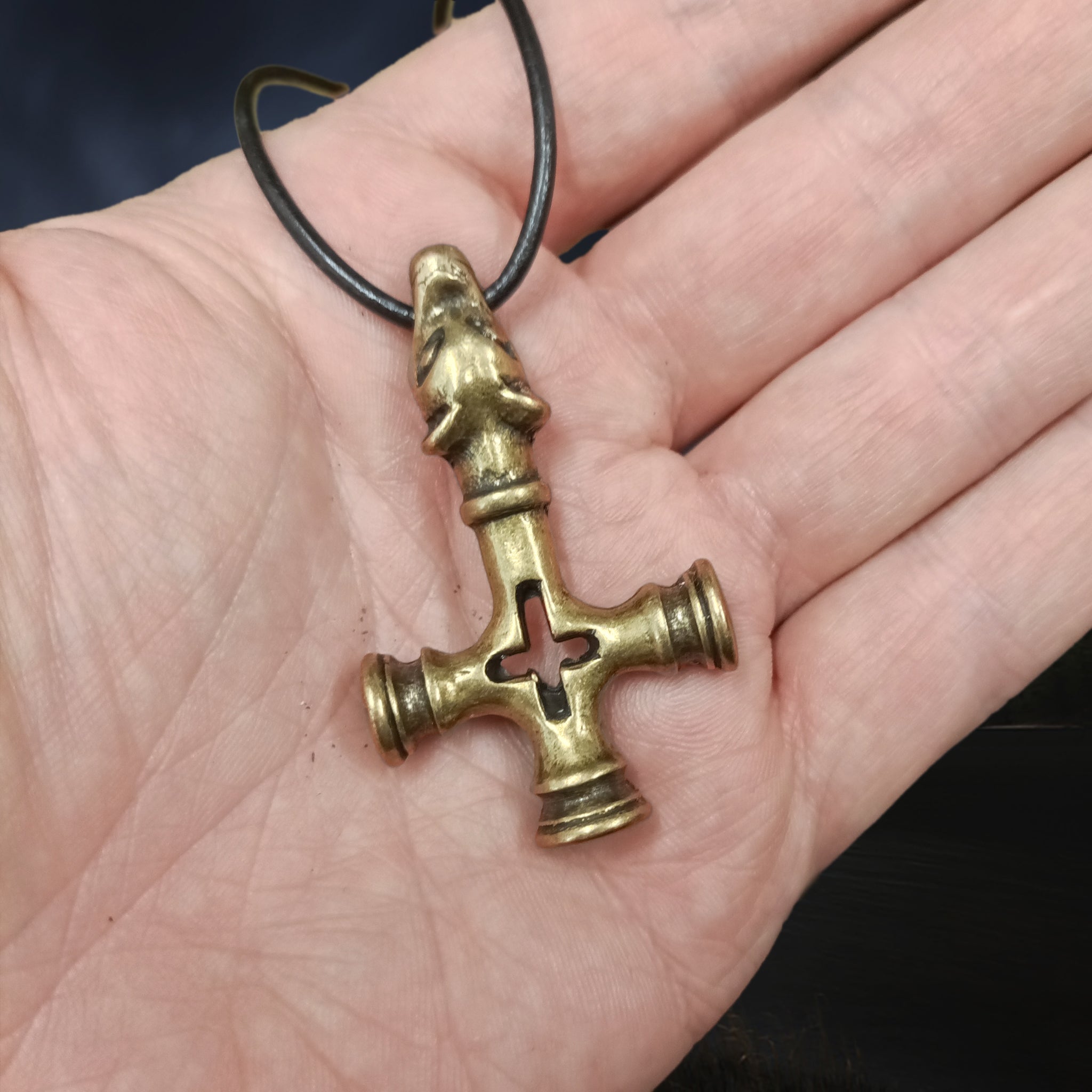 Large Brass Replica of the Original Icelandic Thor's Hammer Cross Pendant, from Foss, Iceland - 11th Century on Leather Cord on Hand