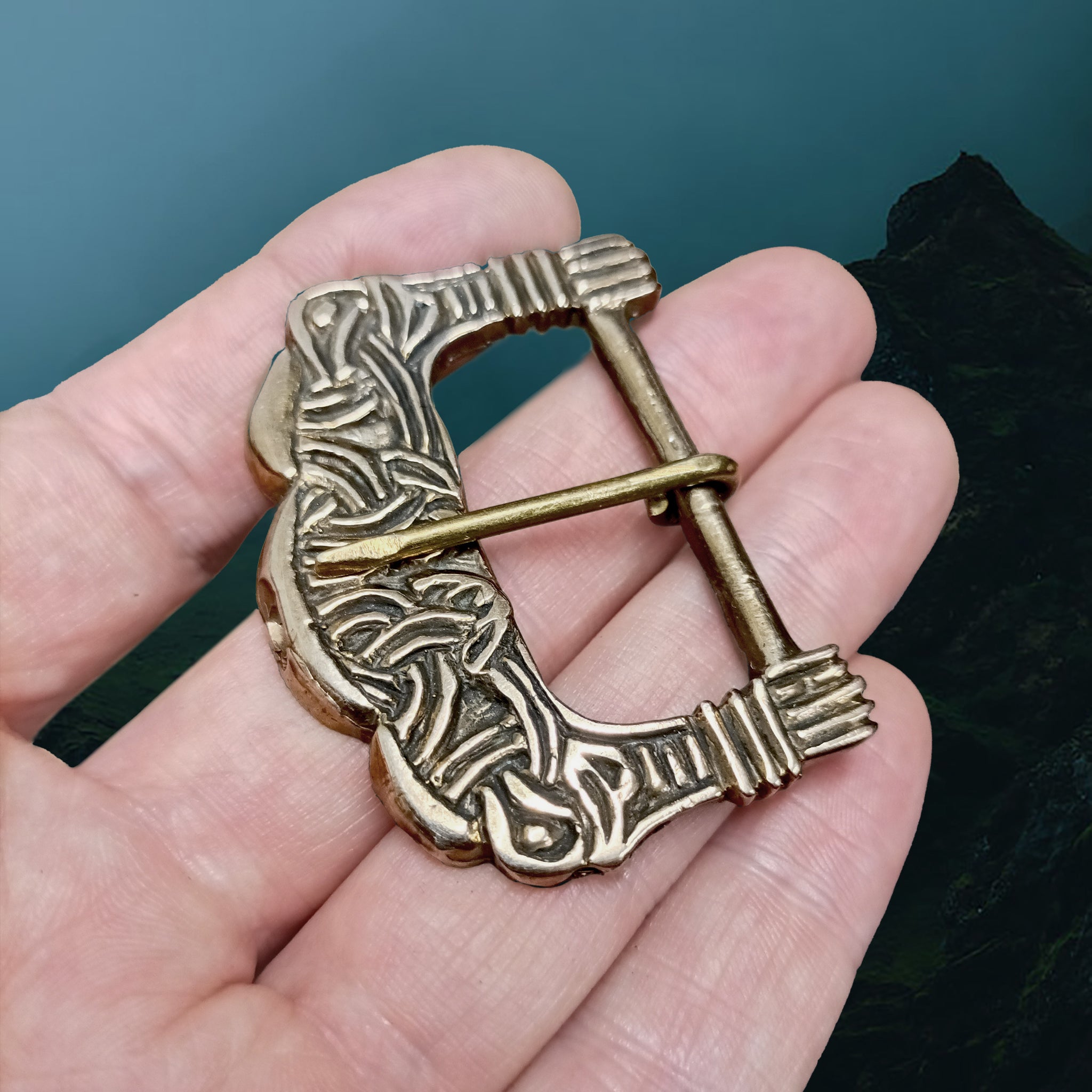 Replica Viking Buckle Found in the Gokstad Ship Burial, Norway, 9th Century in Solid Bronze on Hand - Angle View
