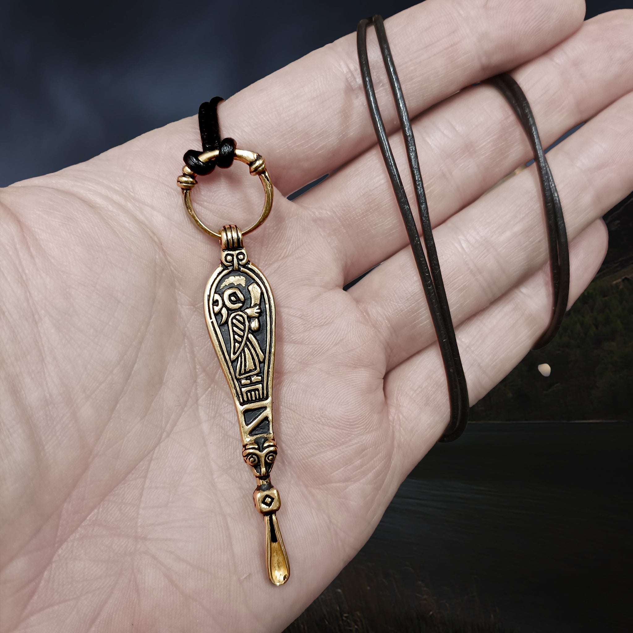 Bronze Ear Spoon Viking Pendant with Ring Hanger on Leather Thong on Hand
