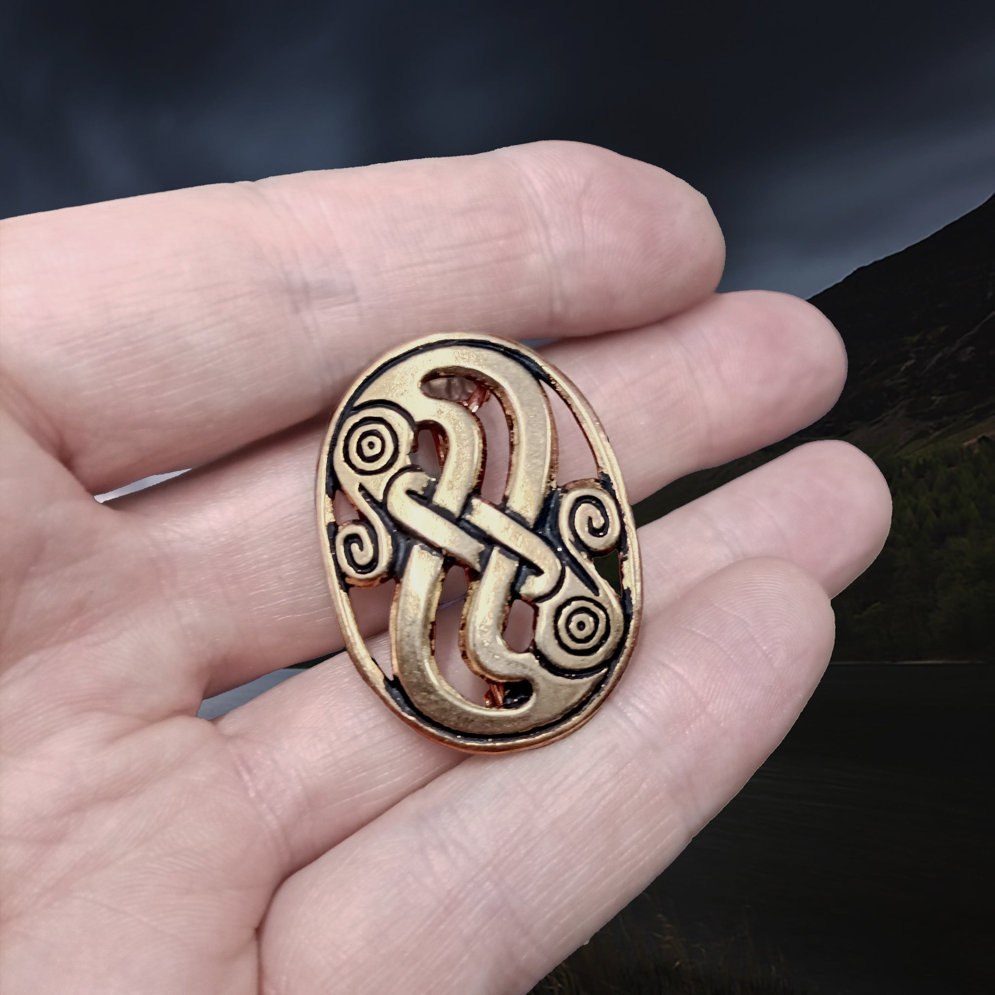 Bronze Gotland Viking Serpent Brooch on Hand