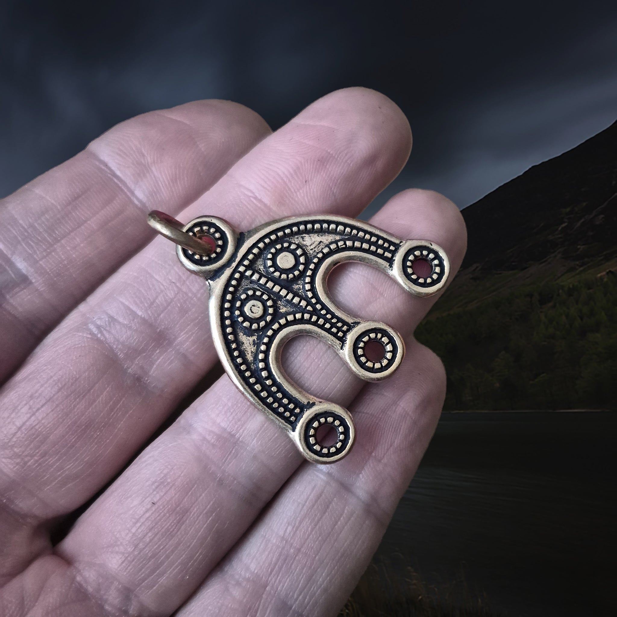 Viking Replica Grave Find - Bronze Bead Divider from Öland on S-Hook Clasp, on Hand - Angle View