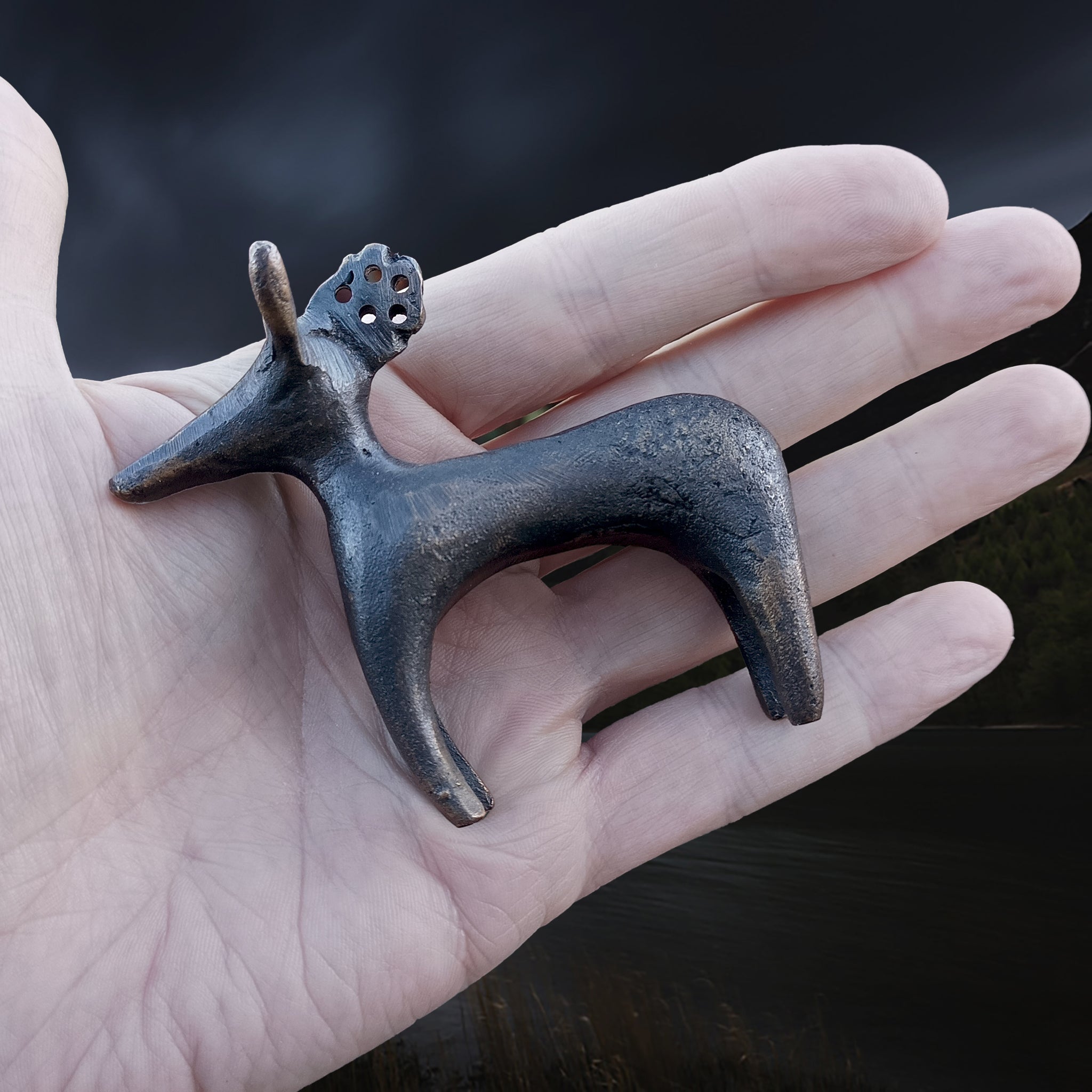 Bronze Age Scandinavian Bronze Bull / Reindeer Animal Statuette in Hand - Left Side View