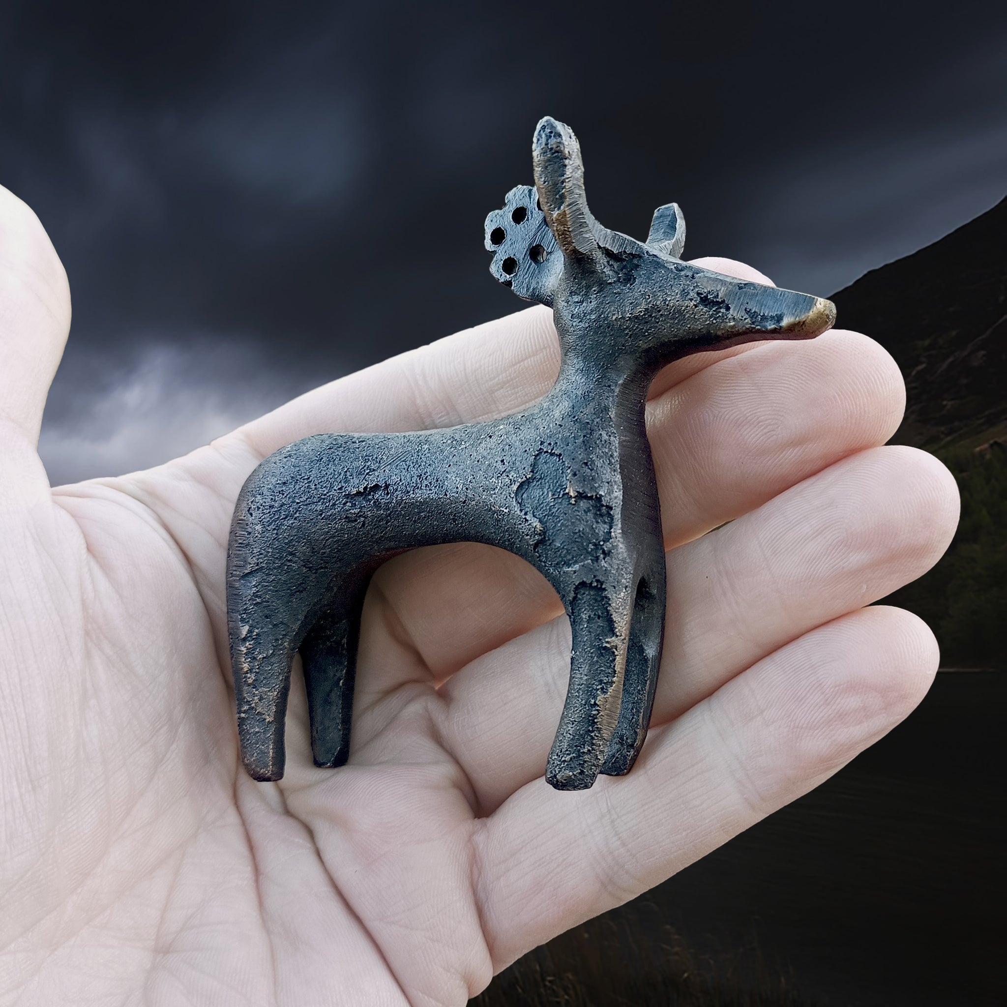 Bronze Age Scandinavian Bronze Bull / Reindeer Animal Statuette in Hand - Right Side View