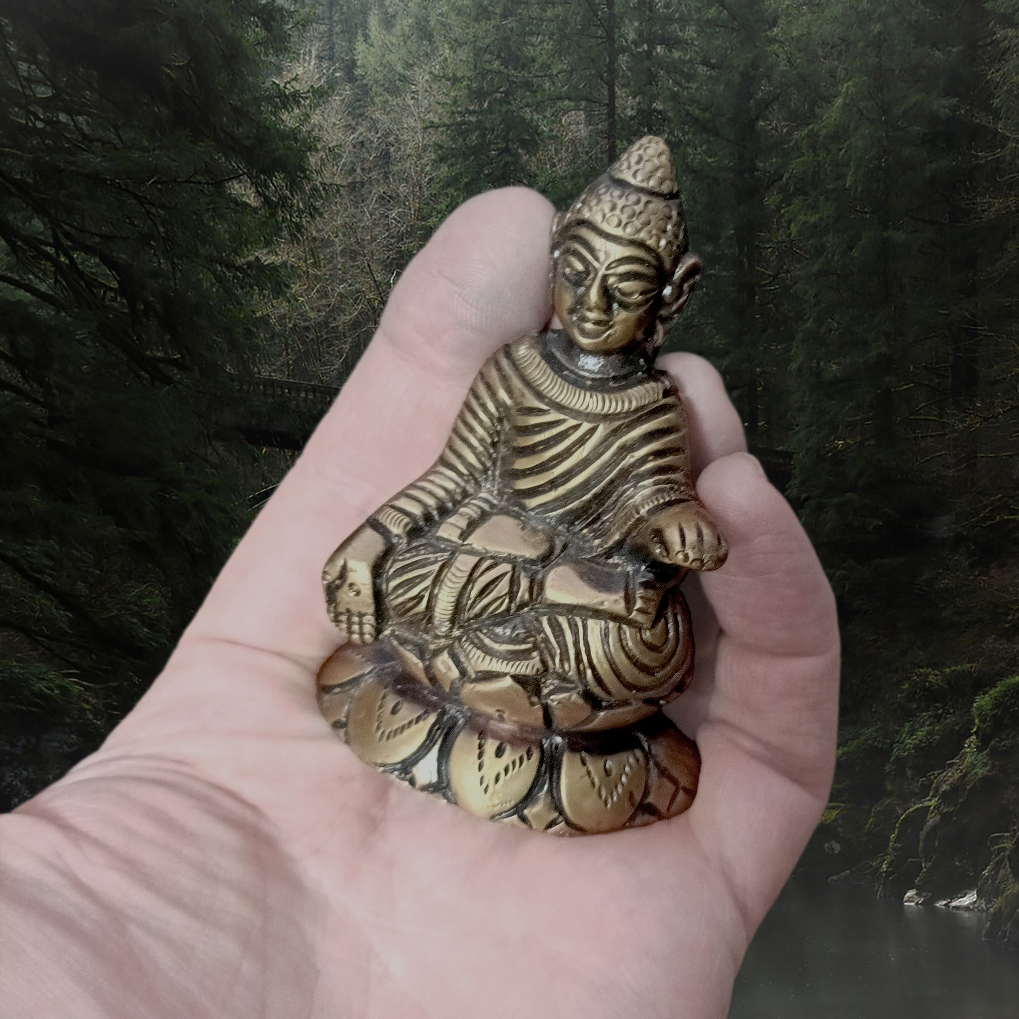 Viking Age Bronze Buddha Statuette Replica from Helgö on Hand - Front Angle View