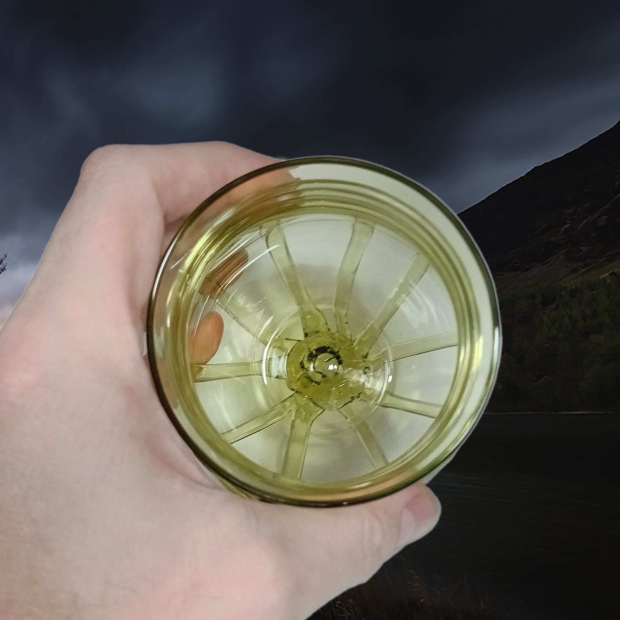 Handmade Round Viking Glass From Birka in Hand - Above View, Showing Inside