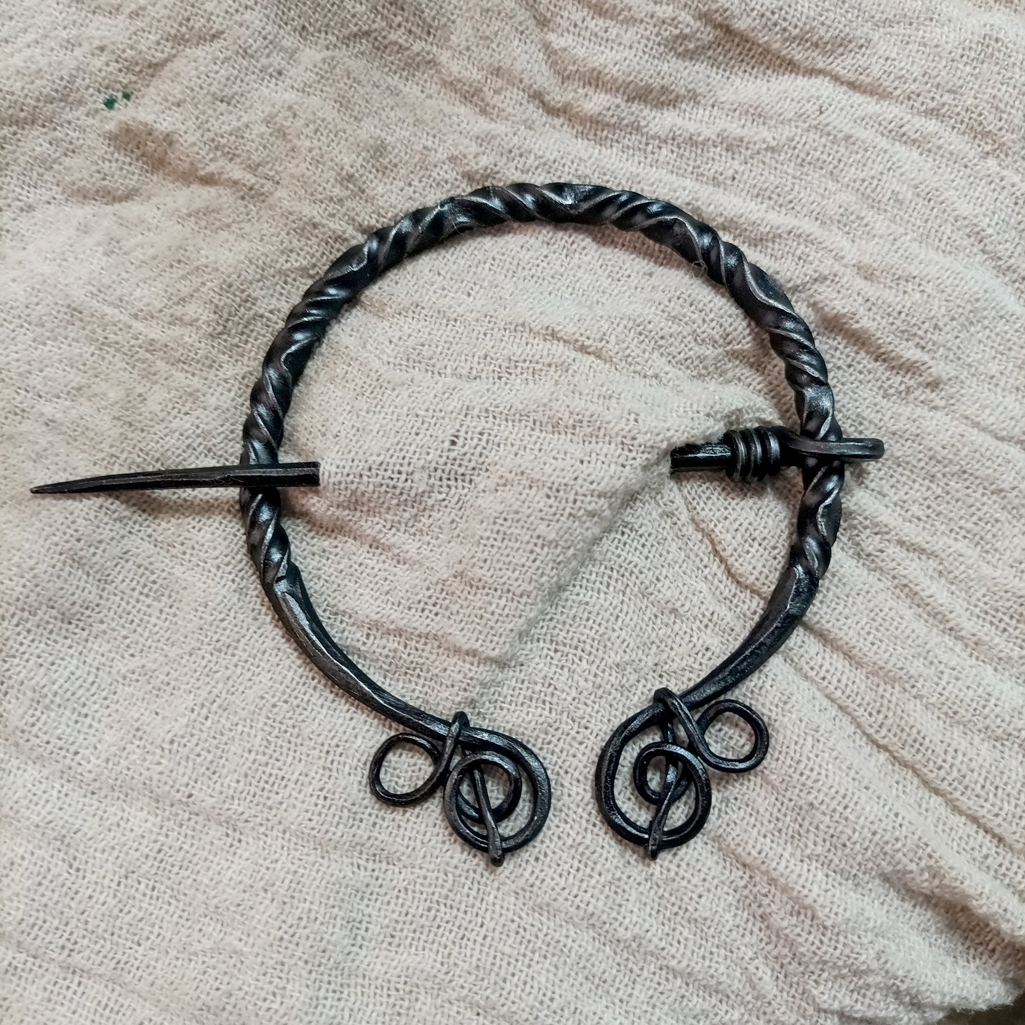 Large Decorated Iron Viking Cloak Pin from Birka in Linen