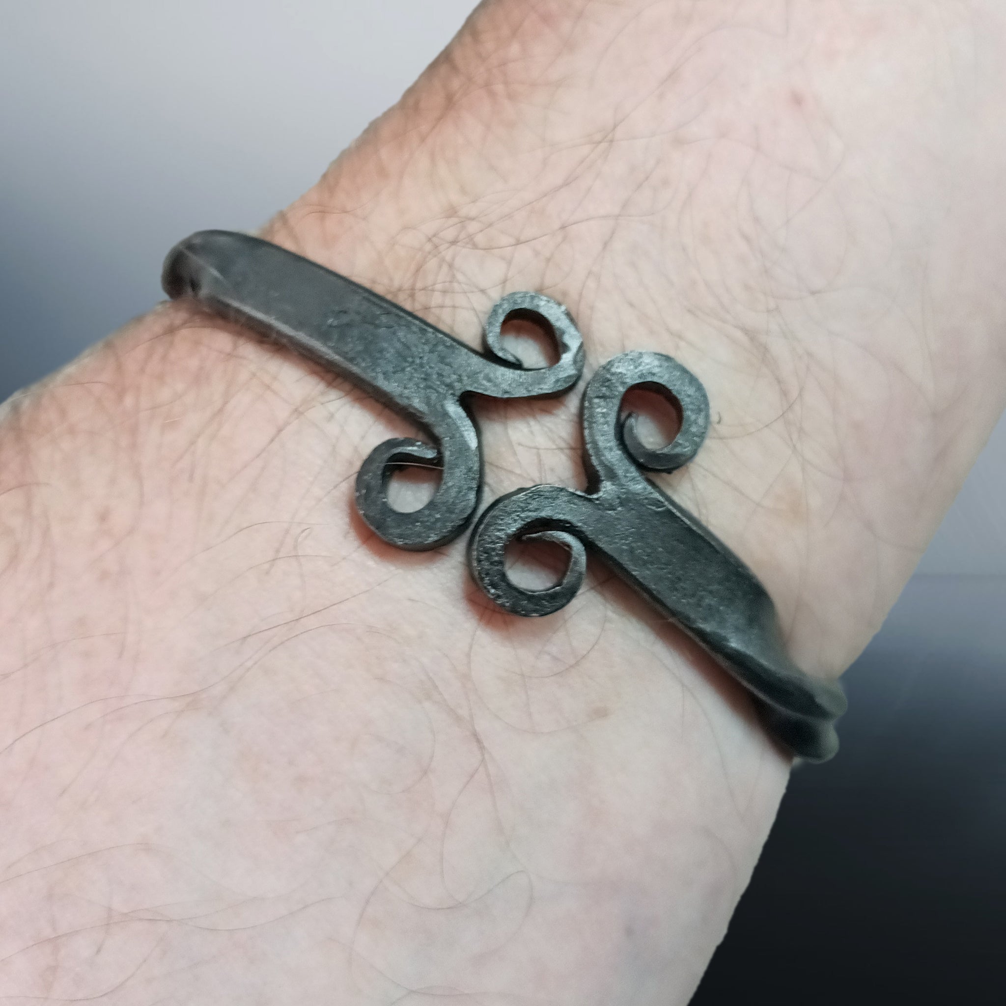 Twisted Iron Viking Bracelet / Arm Ring on Arm - Front View