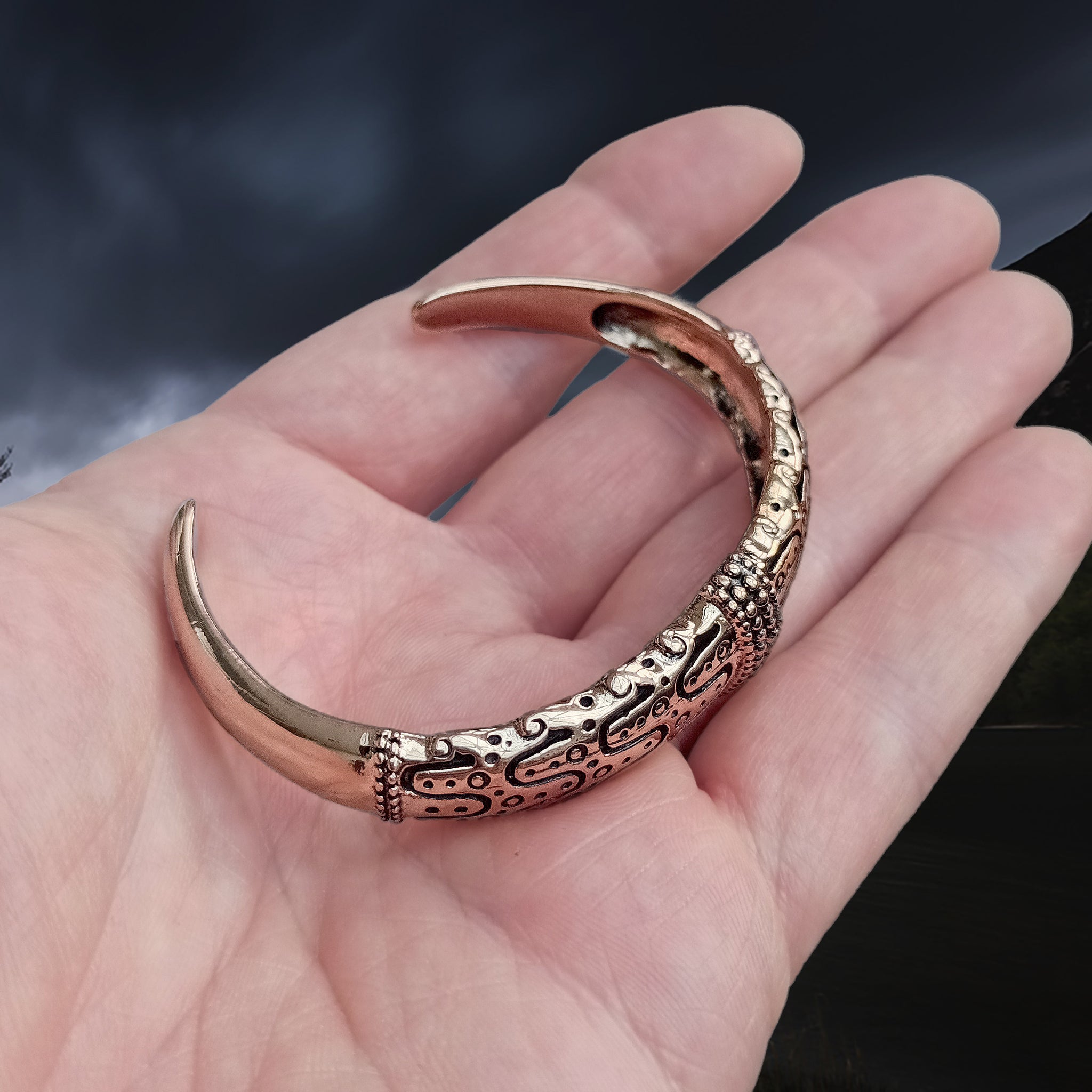 Danish Viking Bronze Bracelet from Falster on Hand - Top Angle View