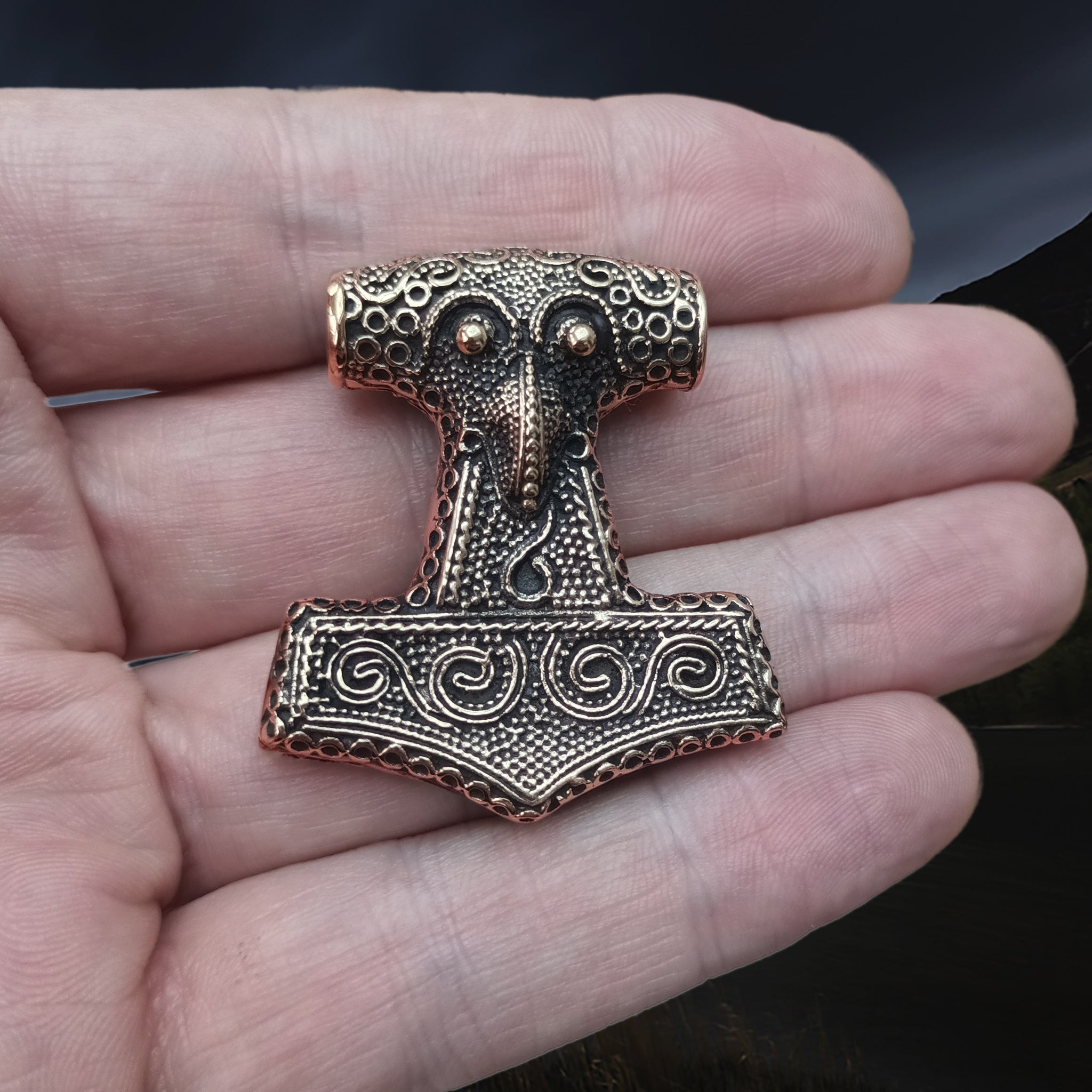 Large Bronze Skåne Thors Hammer Pendant on Hand