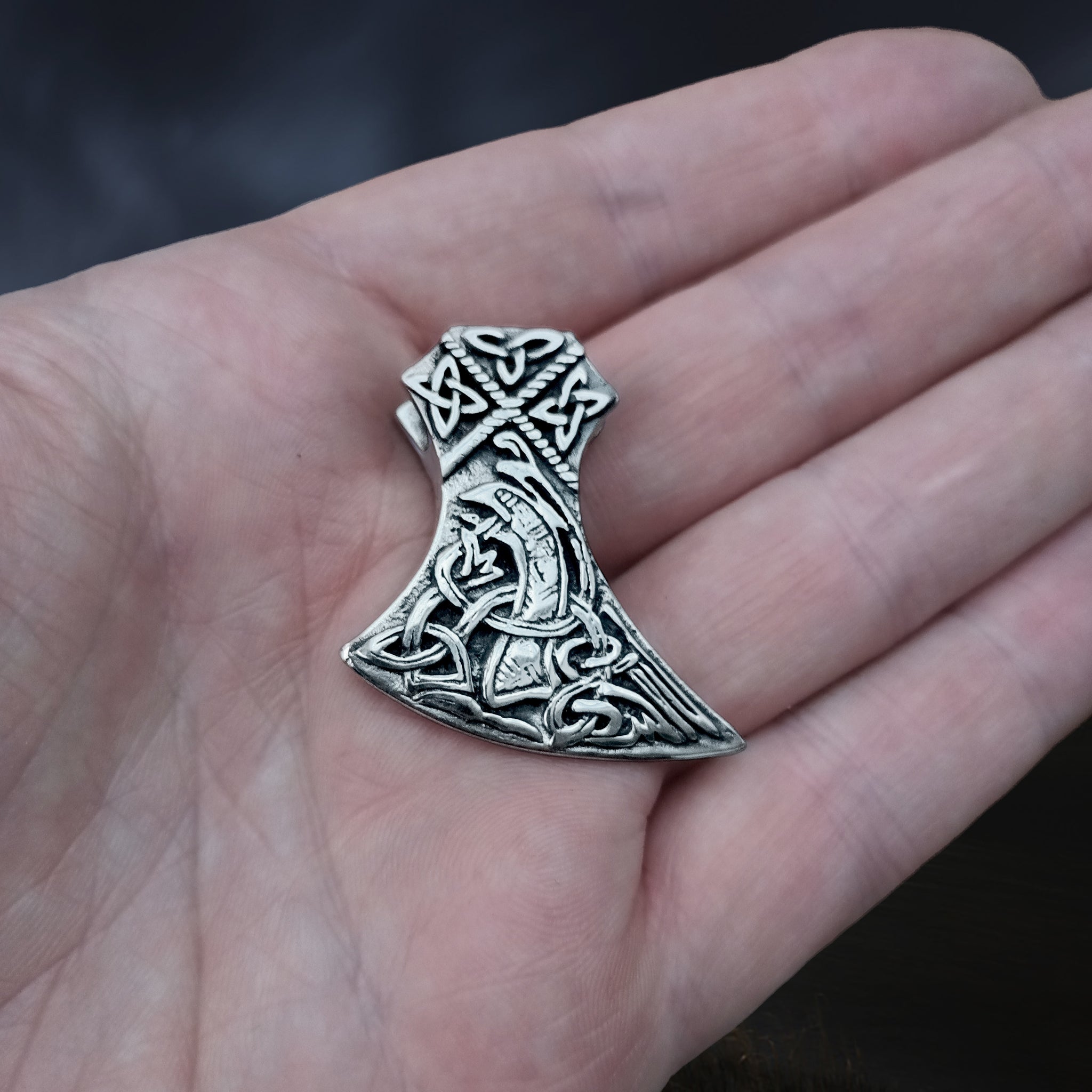 Silver Knotwork Viking Axe Head Pendant on Hand
