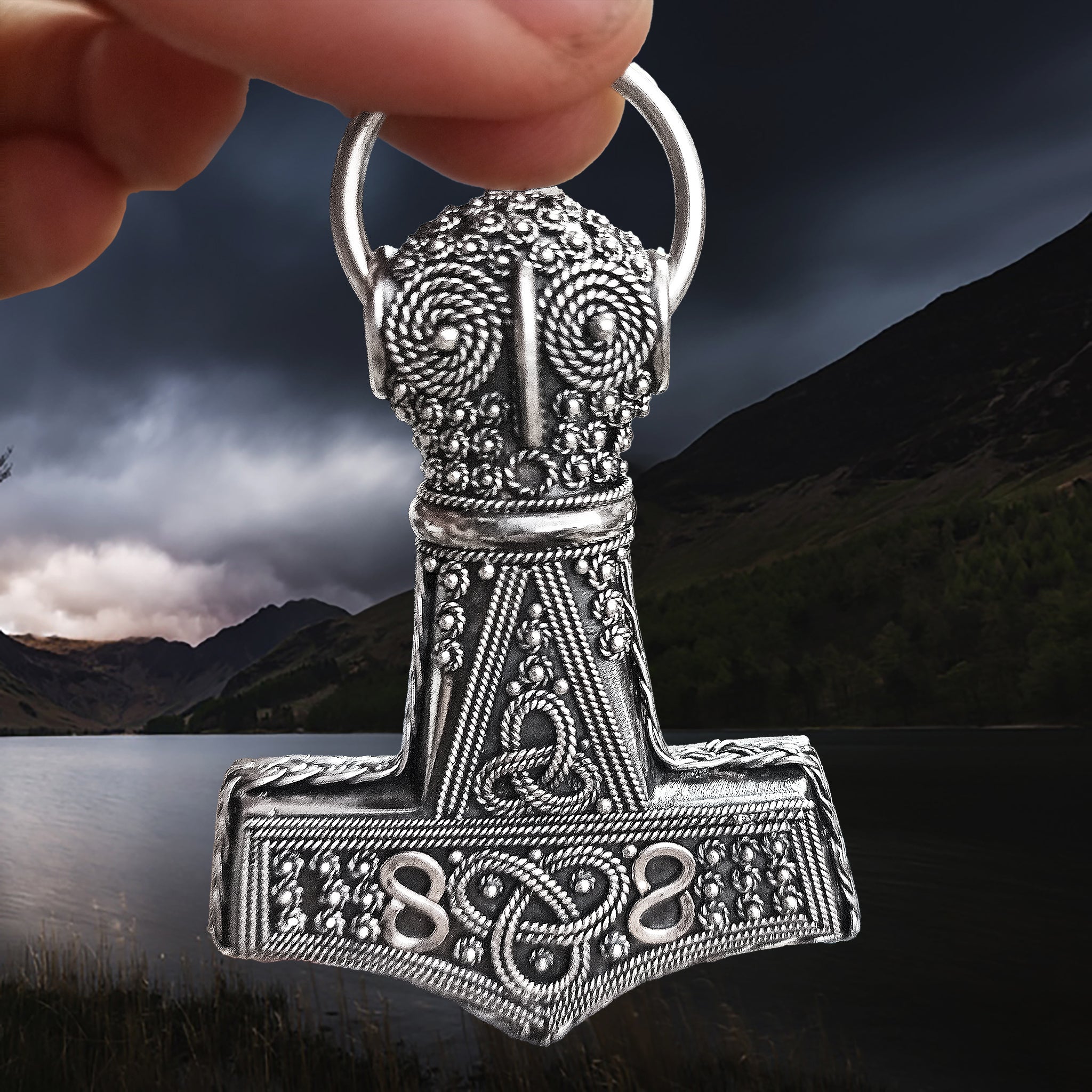 Large Silver Filigree Thors Hammer Pendant Replica from Öland in Fingers