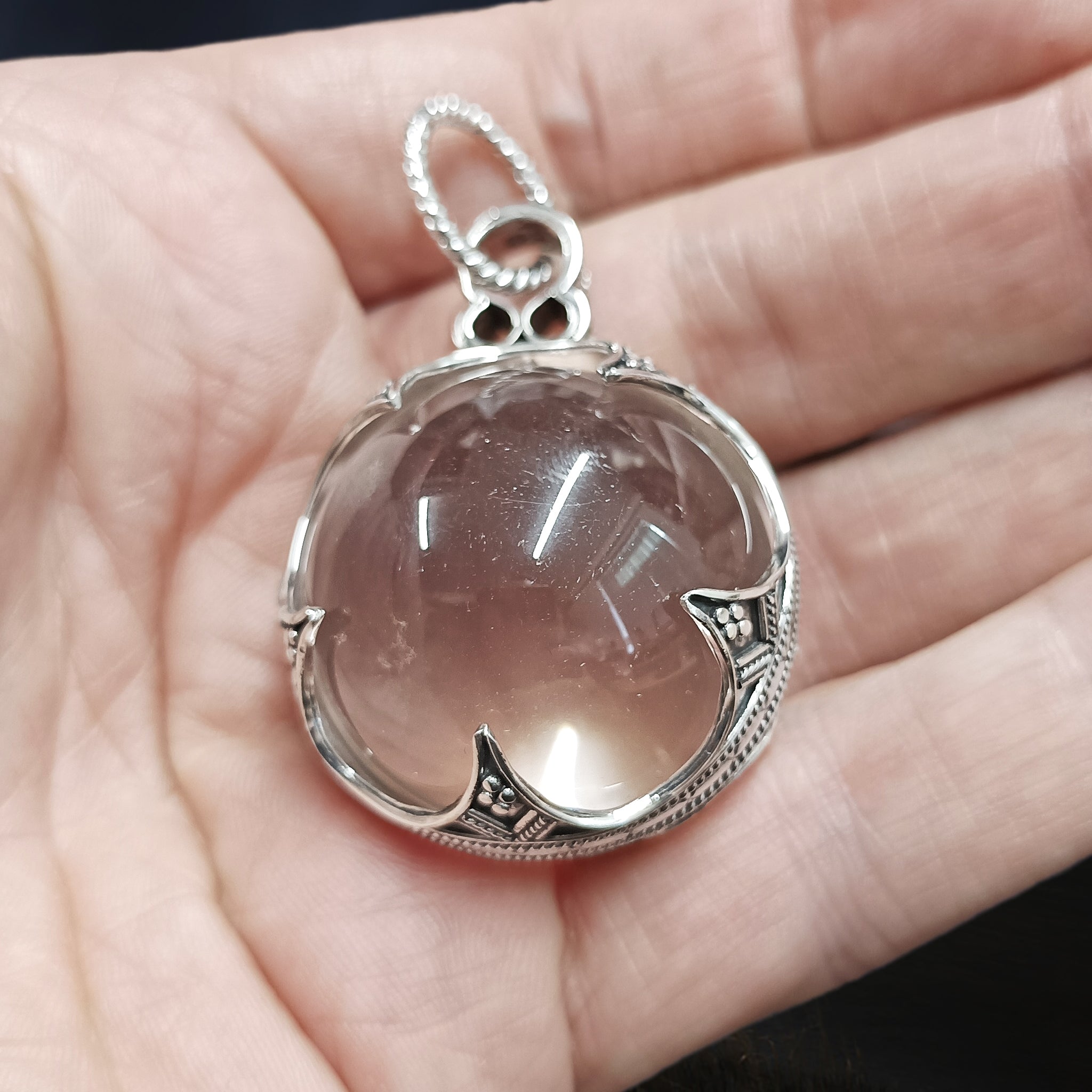 Large Silver Gotland Crystal Ball Pendant in Hand