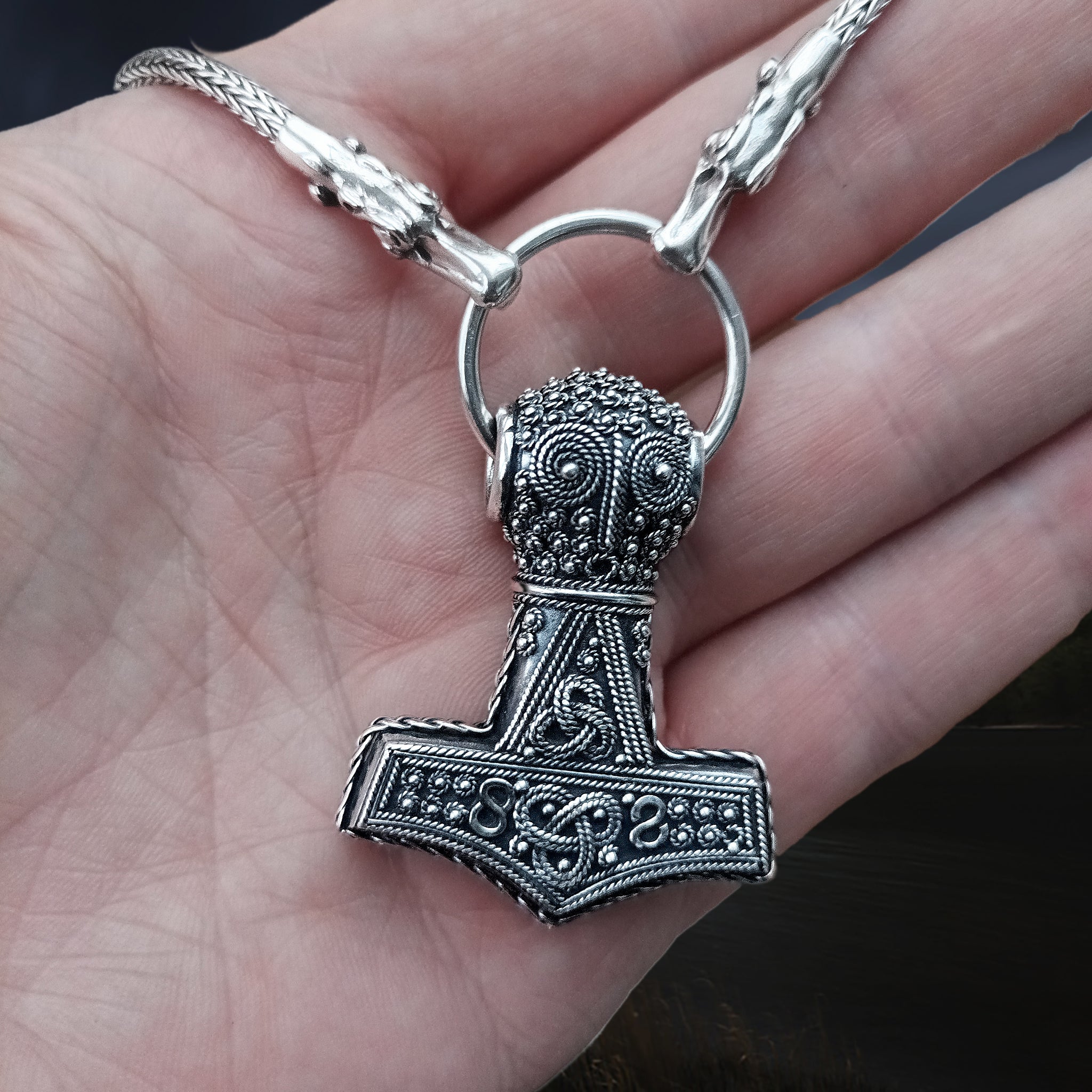 Silver Filigree Thors Hammer Pendant Replica from Öland with Split Ring and Silver Snake Chain with Tromso Dragon Heads on Hand