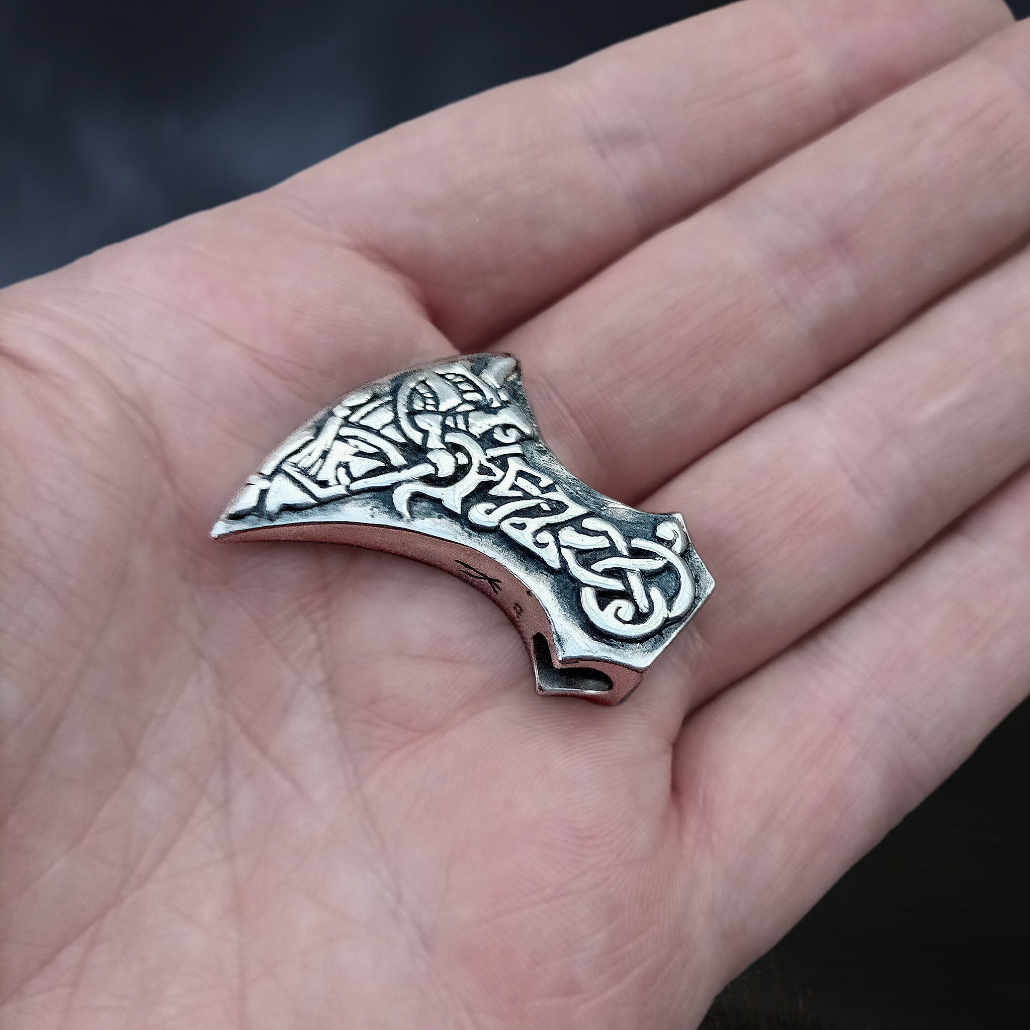 Silver Tyr and Fenrir Viking Axe Head Pendant on Hand - Other Anlge View