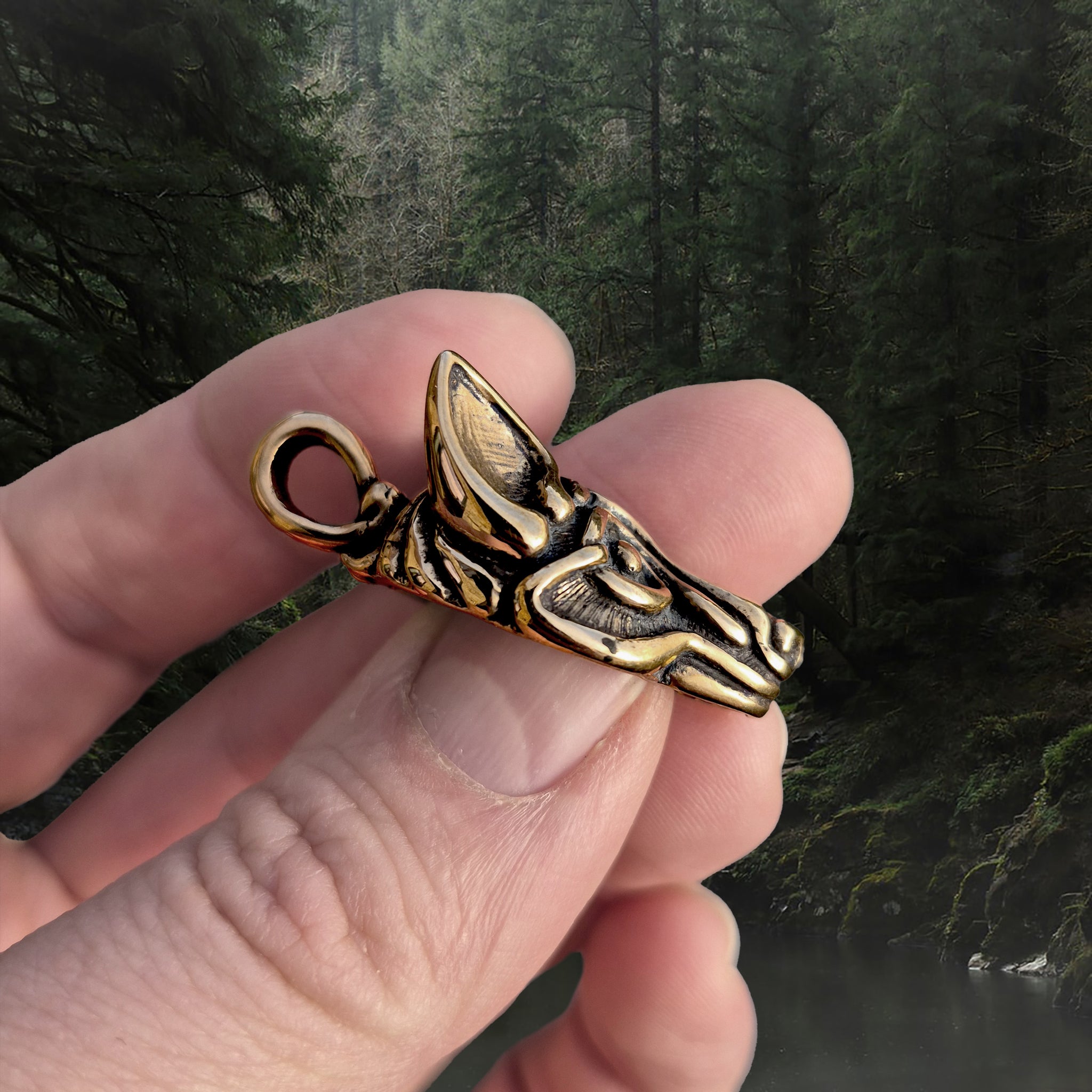 Bronze Borre Style Viking Wolf Head Pendant in Hand- Side View