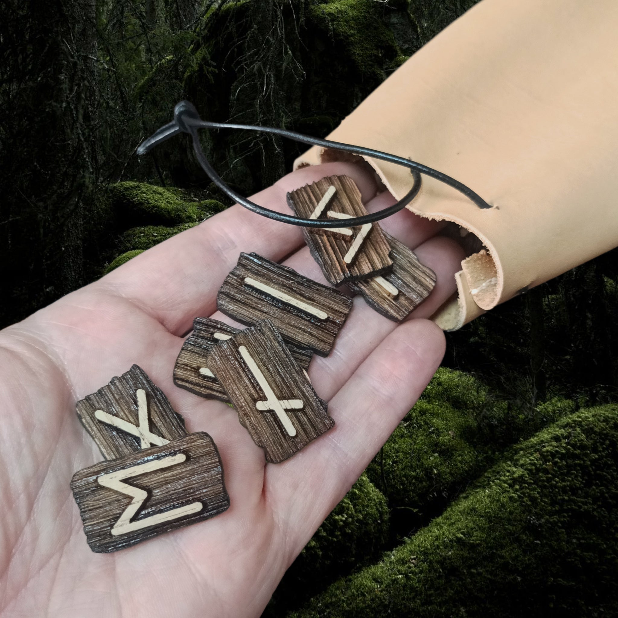 Elder Futhark Wooden Rune Set with Leather Pouch in Hand