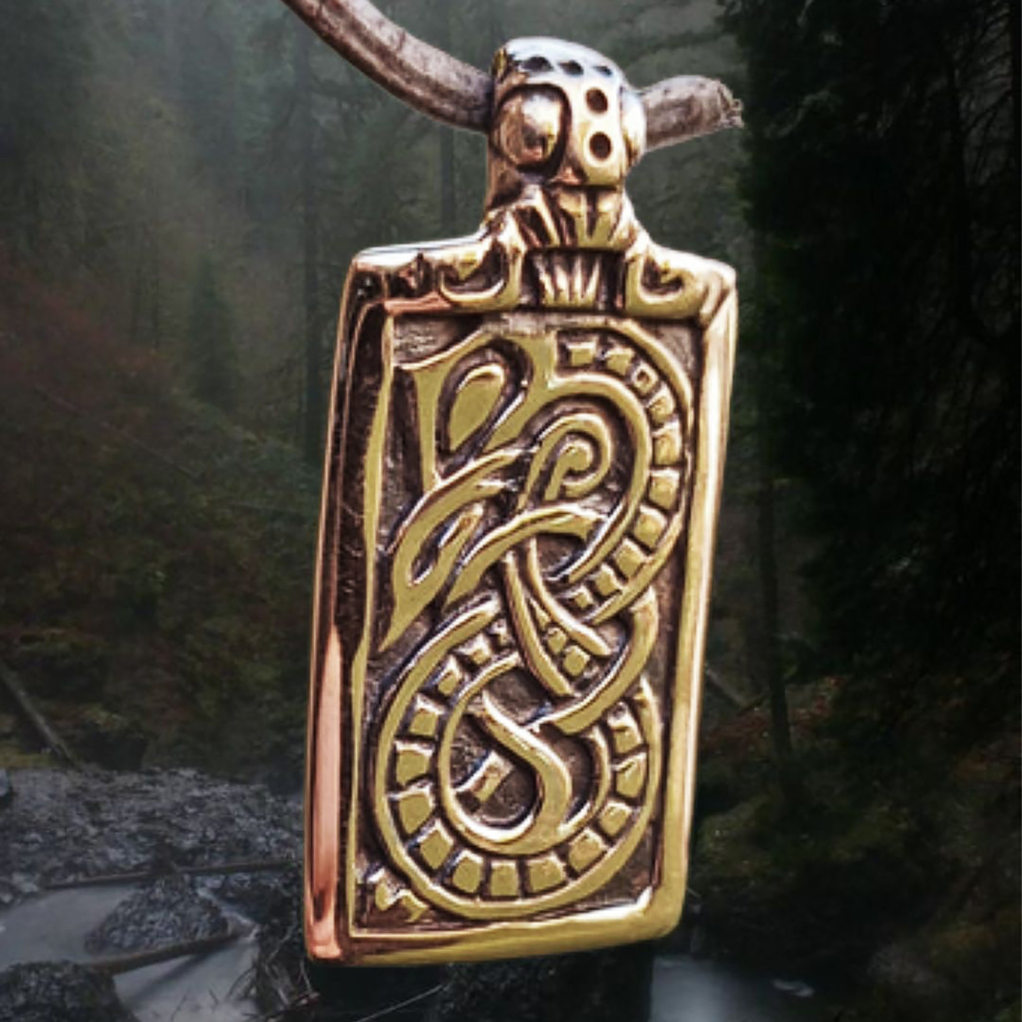 Bronze Jelling Serpent Pendant on Mystical Wood Background