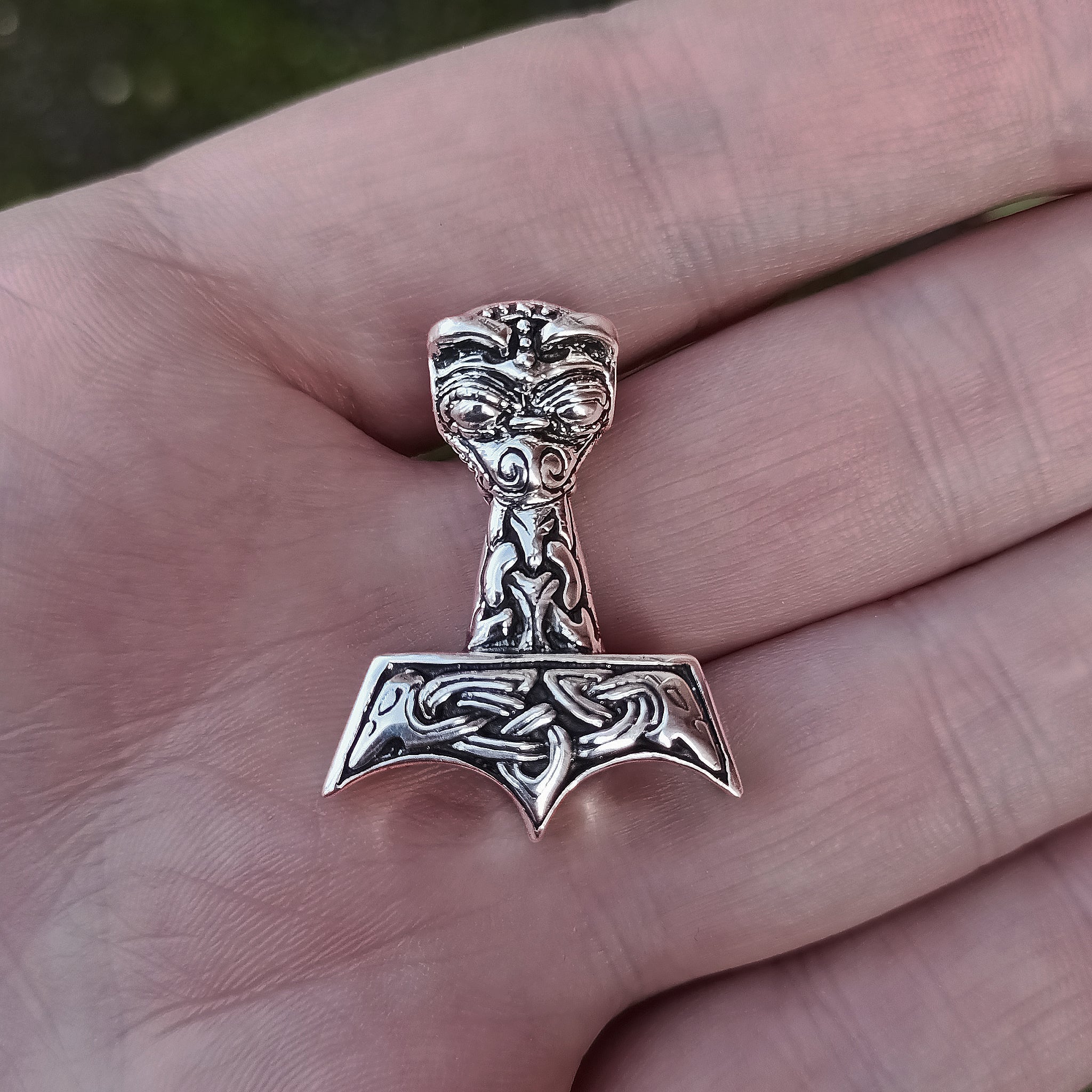 Silver Ferocious Beast Thors Hammer Pendant on Hand