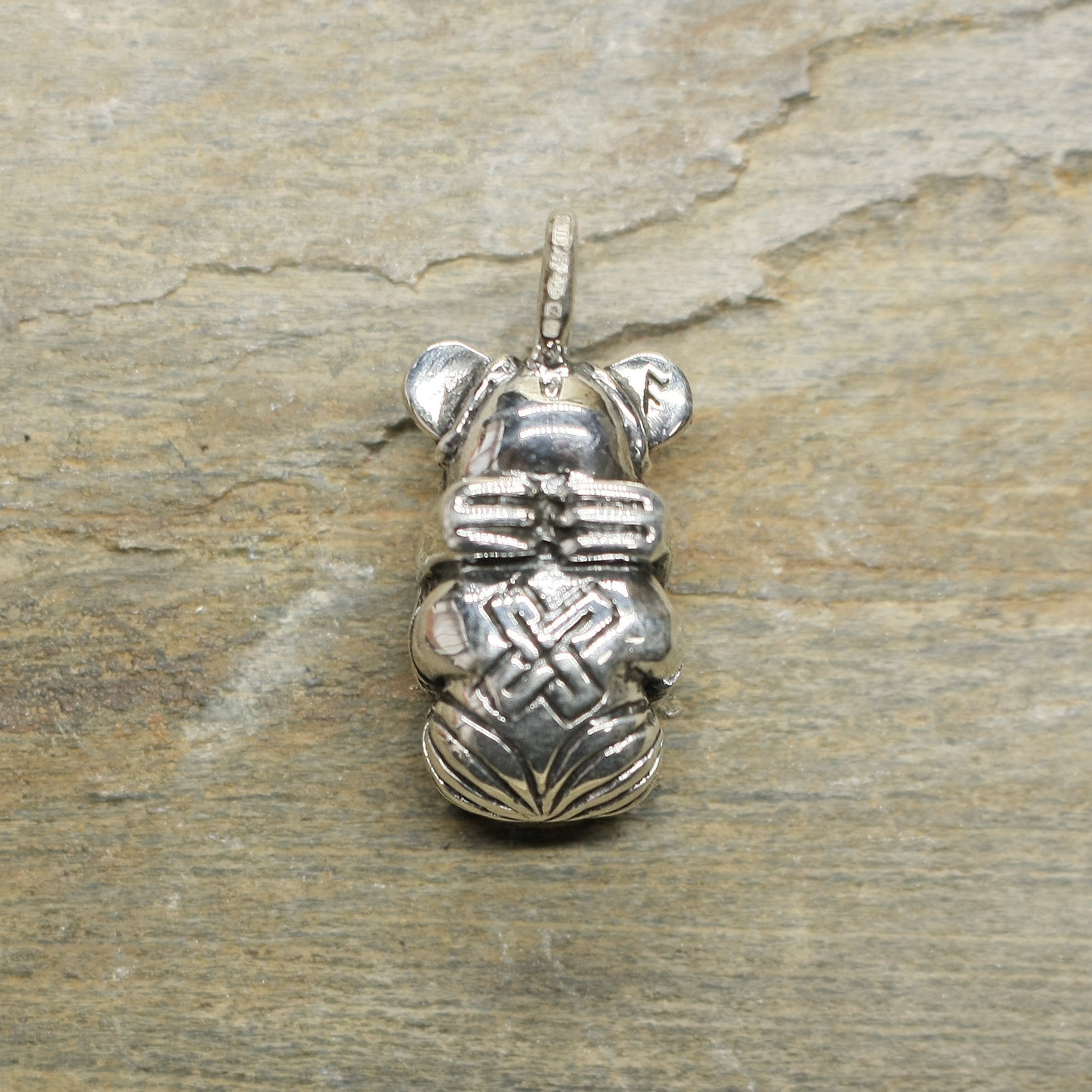 Silver Gripping Bear Pendant Replica from Norway on Rock - Back