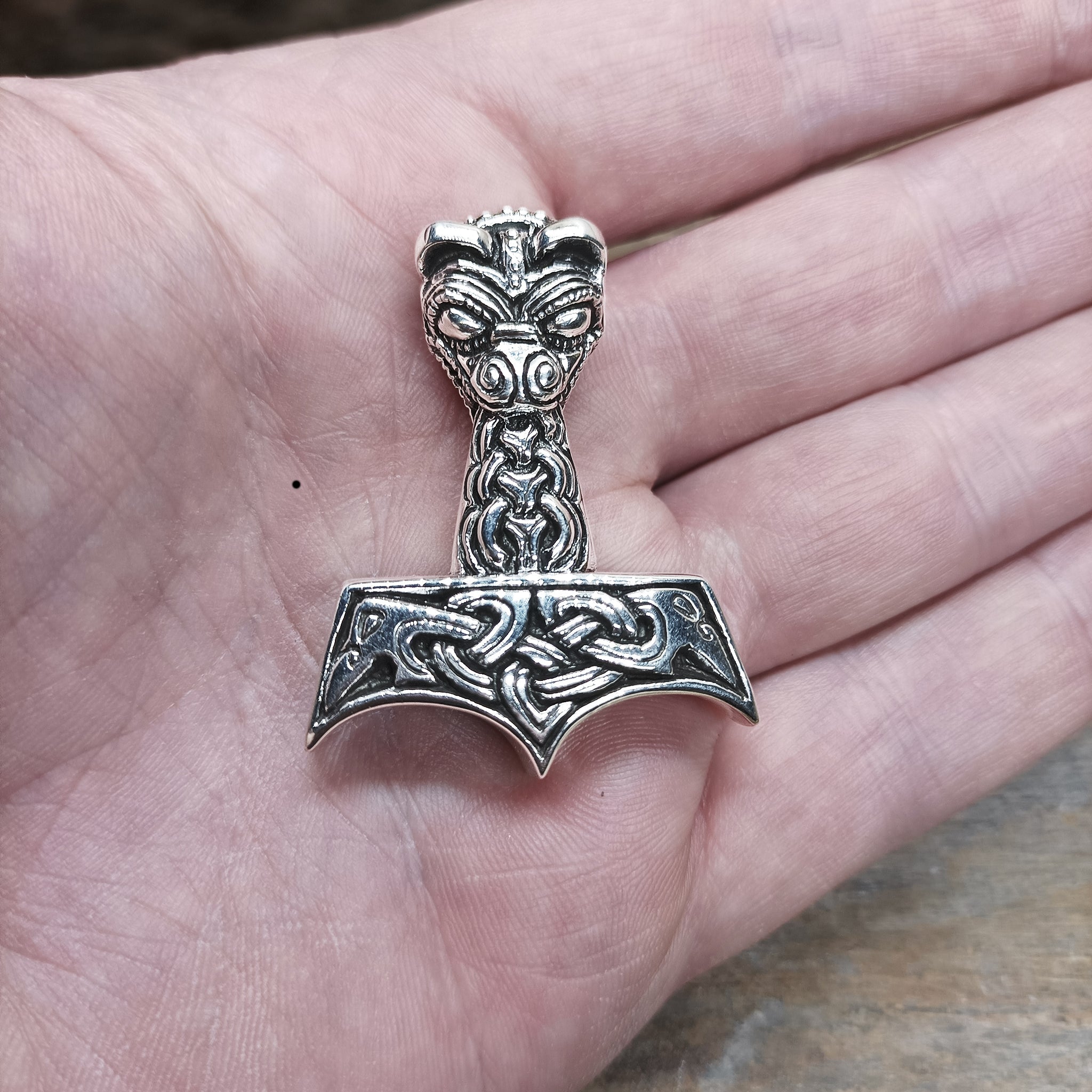 Silver Large And Ferocious Thors Hammer Pendant on Hand