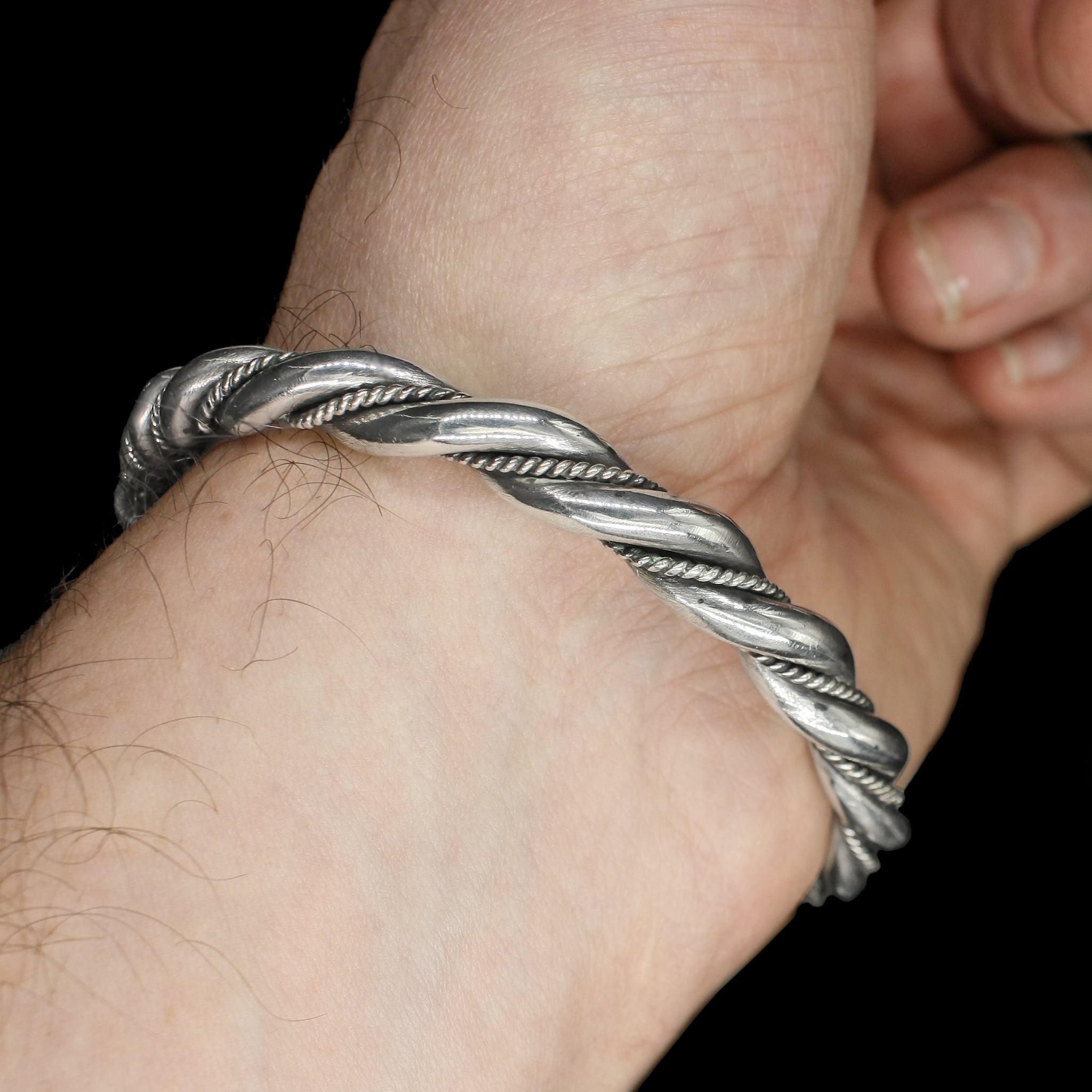 Medium Twisted Silver Arm Ring on Wrist