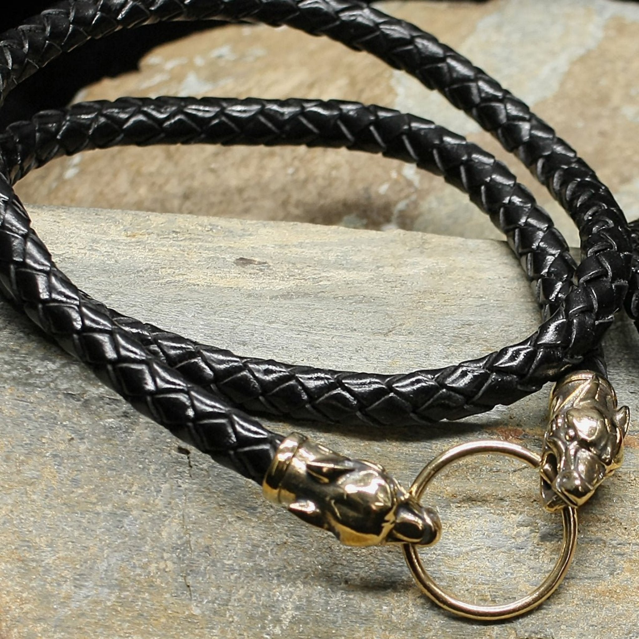 Black Braided Leather Viking Necklace with Ferocious Beast Wolf Heads Holding Medium Bronze Split Ring