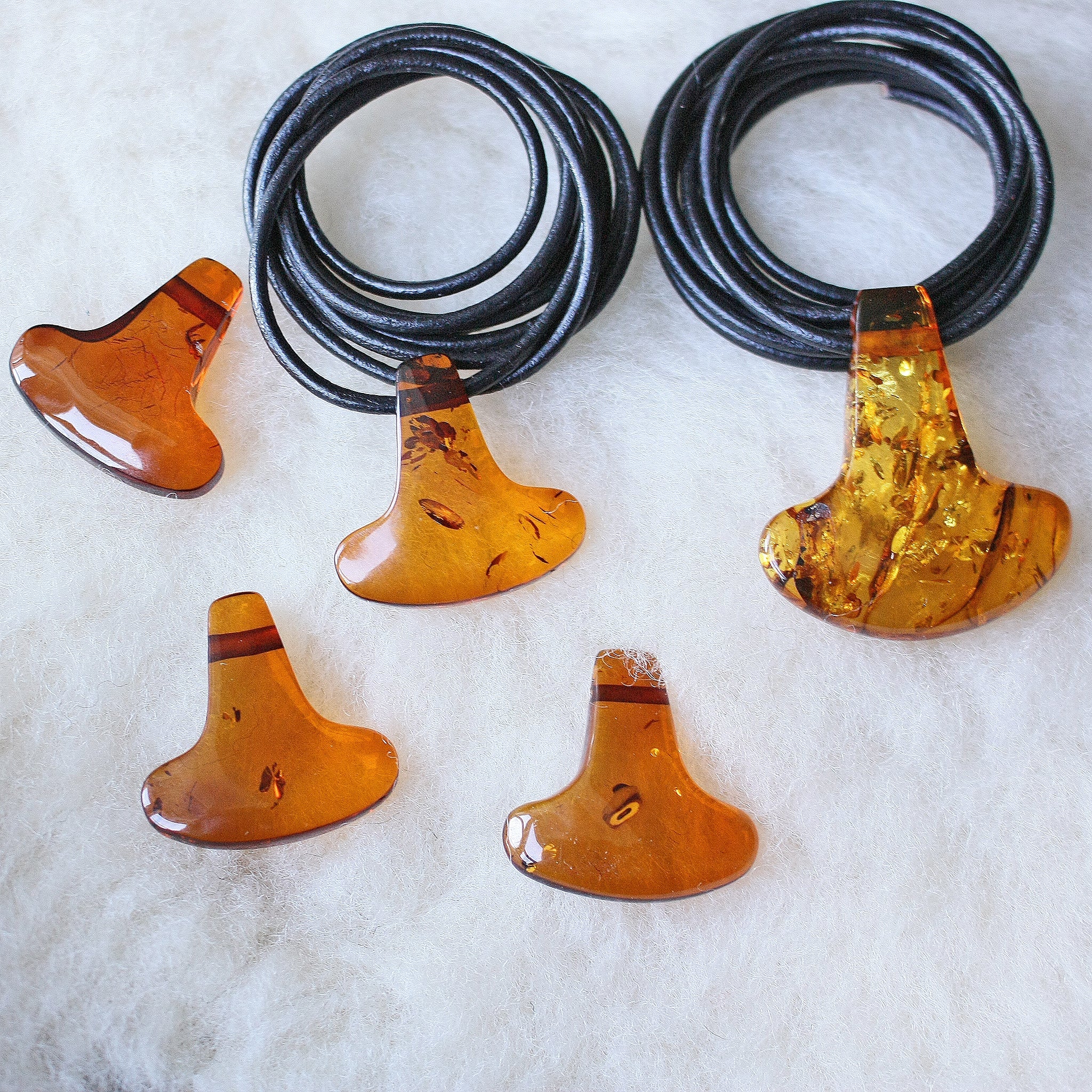 Amber Thors Hammer Pendants on Wool - Various Sizes