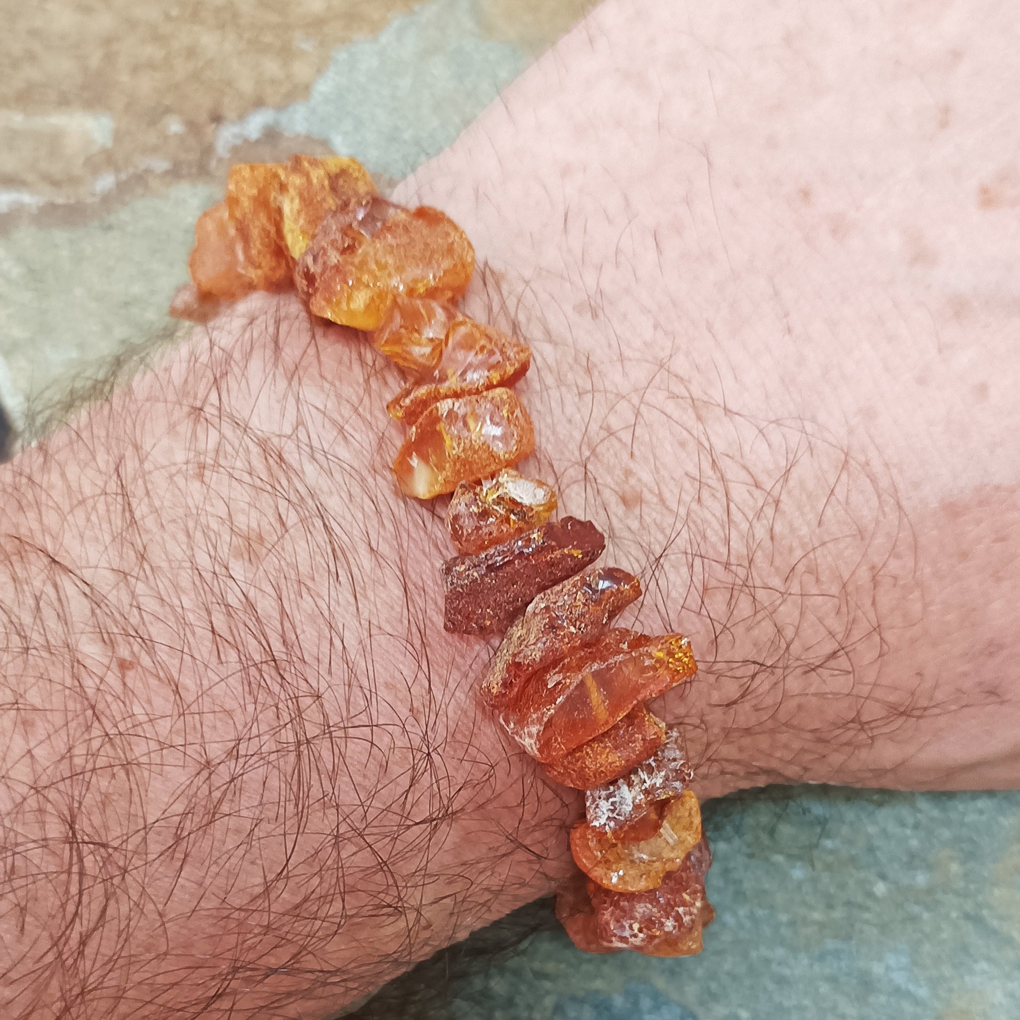 Raw Amber Chip Bracelet on Wrist - Front View