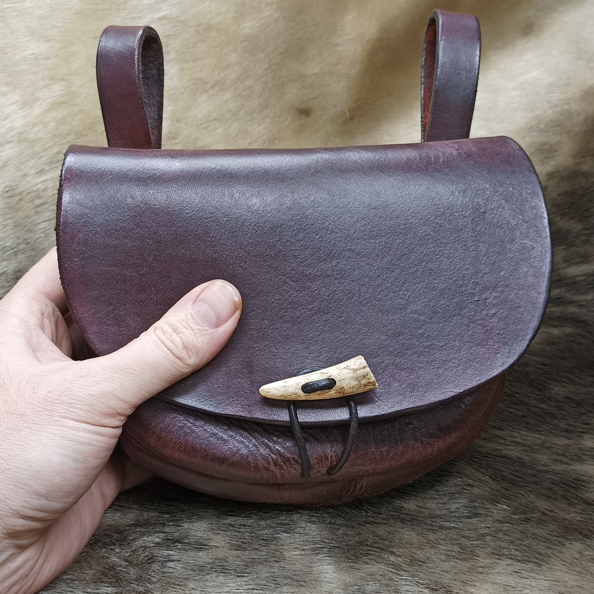 Turned Brown Leather Viking Belt Pouch in Hand