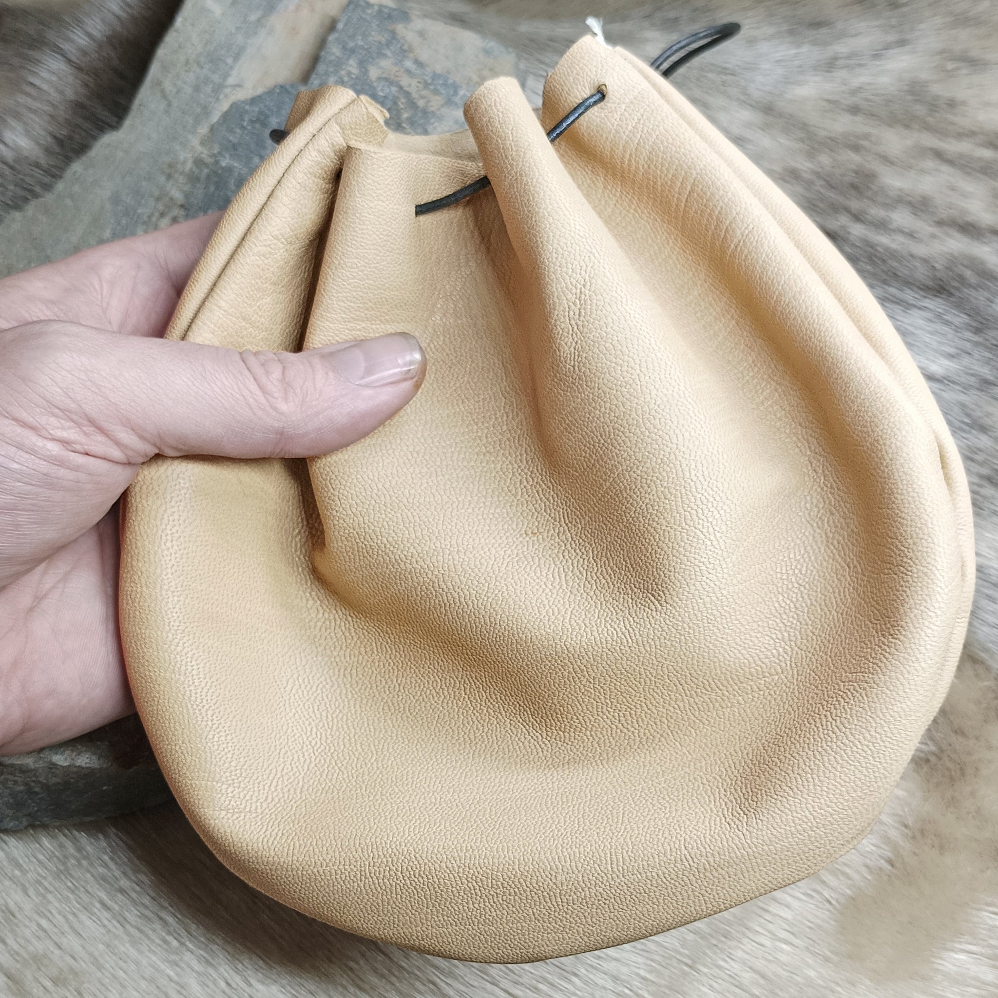 Large Leather Draw String Pouch in Hand