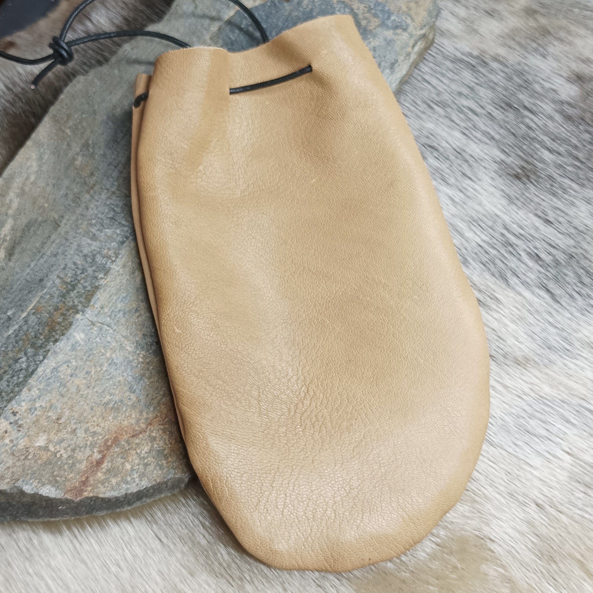 Medium Leather Draw String Pouch on Rock
