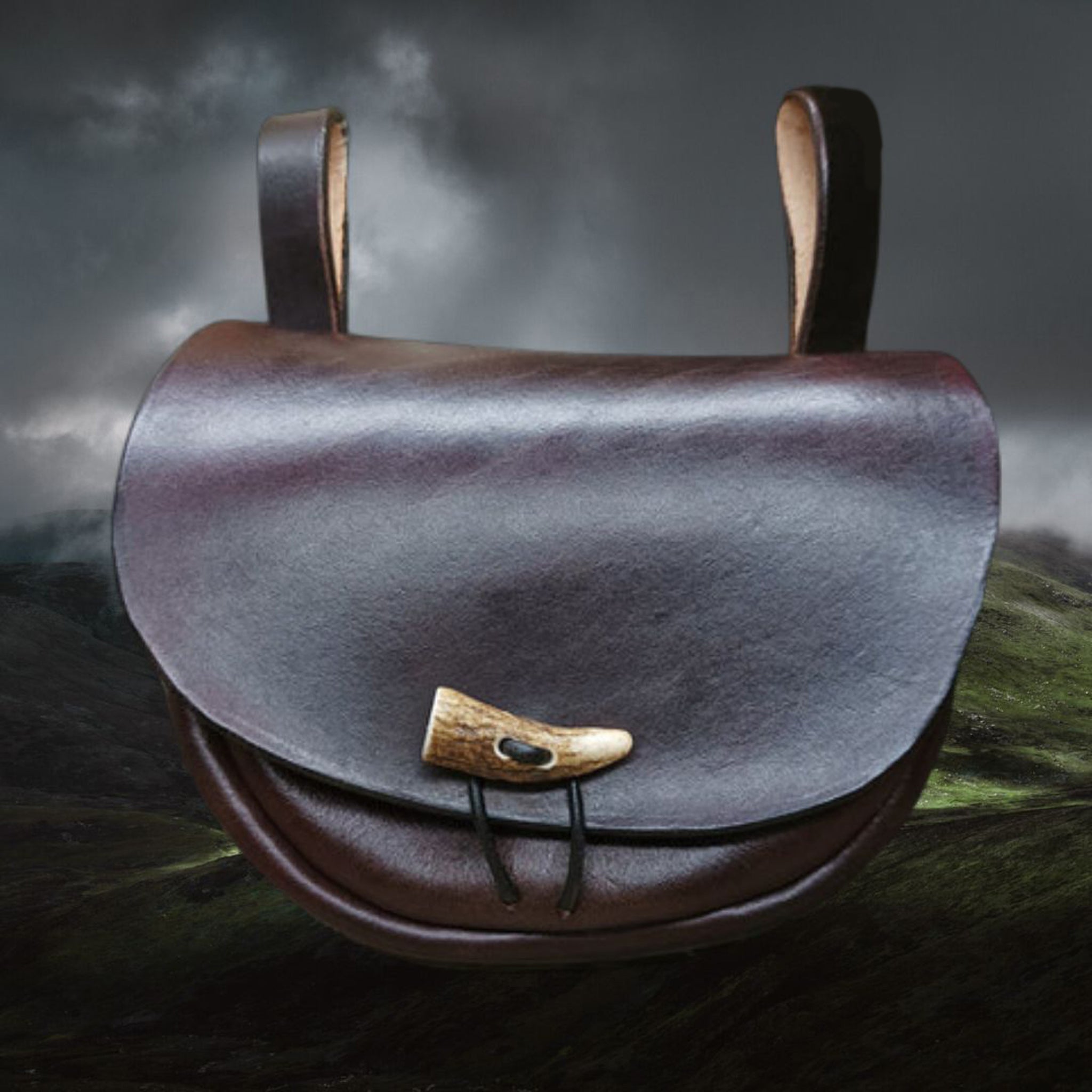 Turned Brown Leather Viking Belt Pouch on Cloudy Hills Background