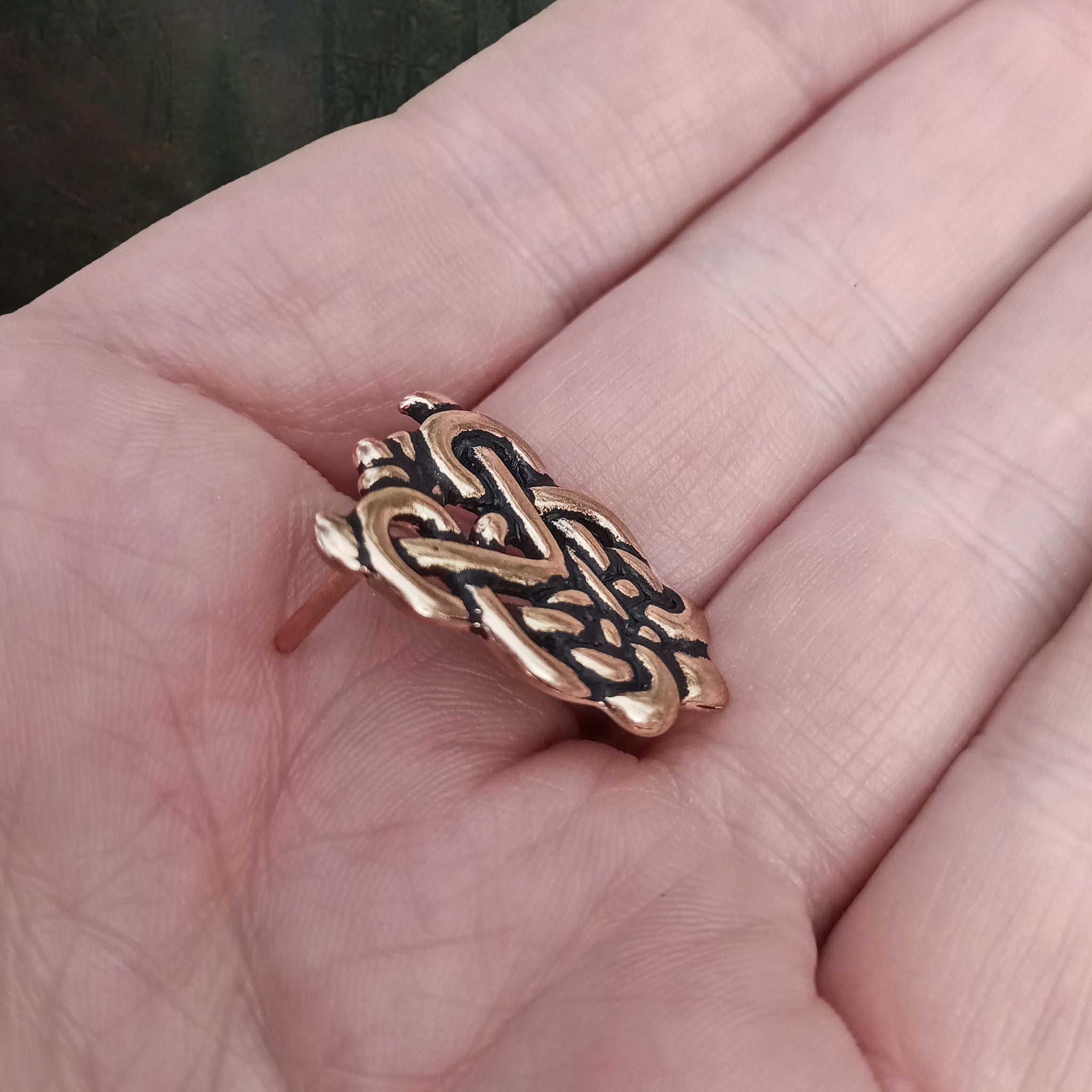 Bronze Ringerike Style Knotwork Viking Strap End on Hand - Side Angle View