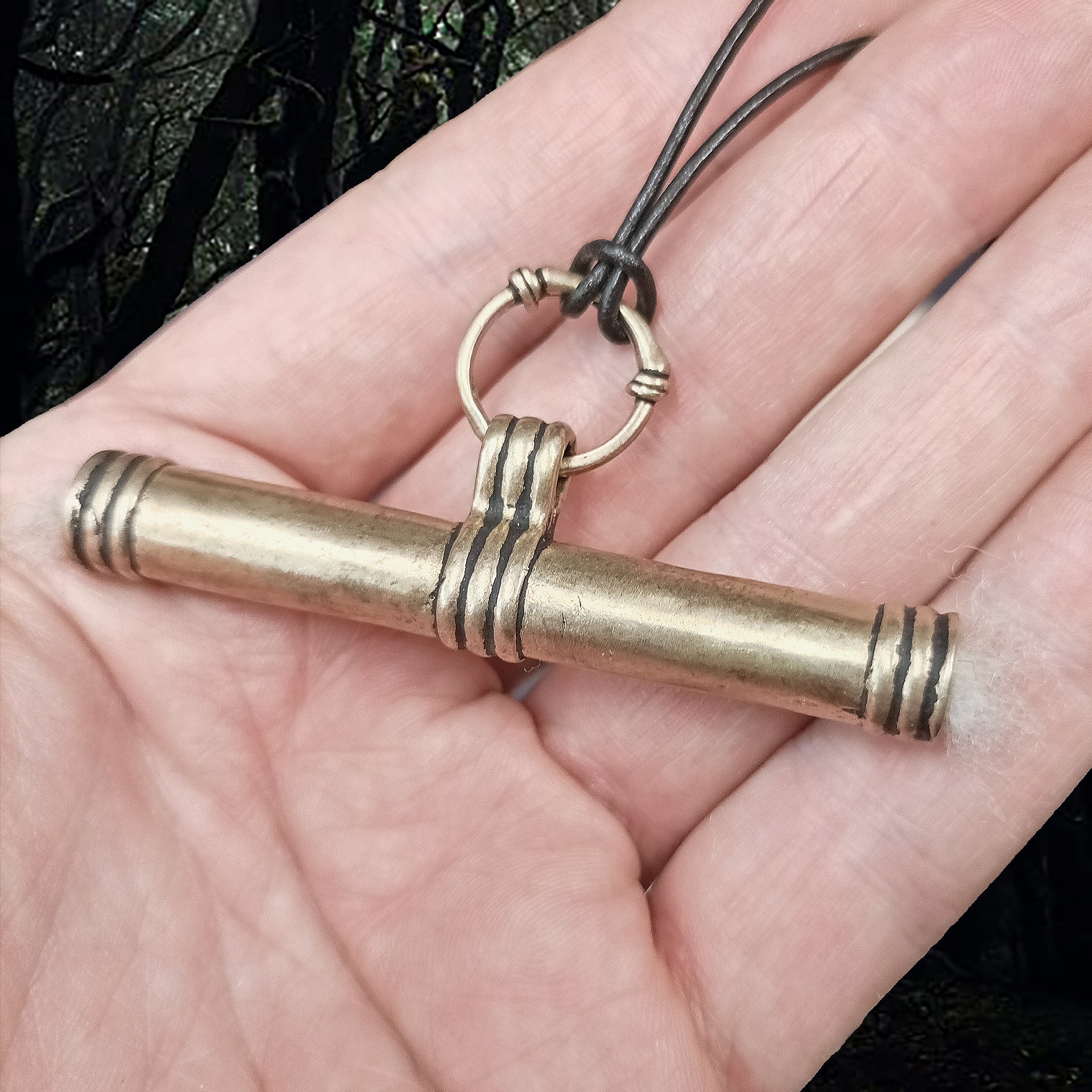 Bronze Replica Viking Needle Case from Sweden in Hand